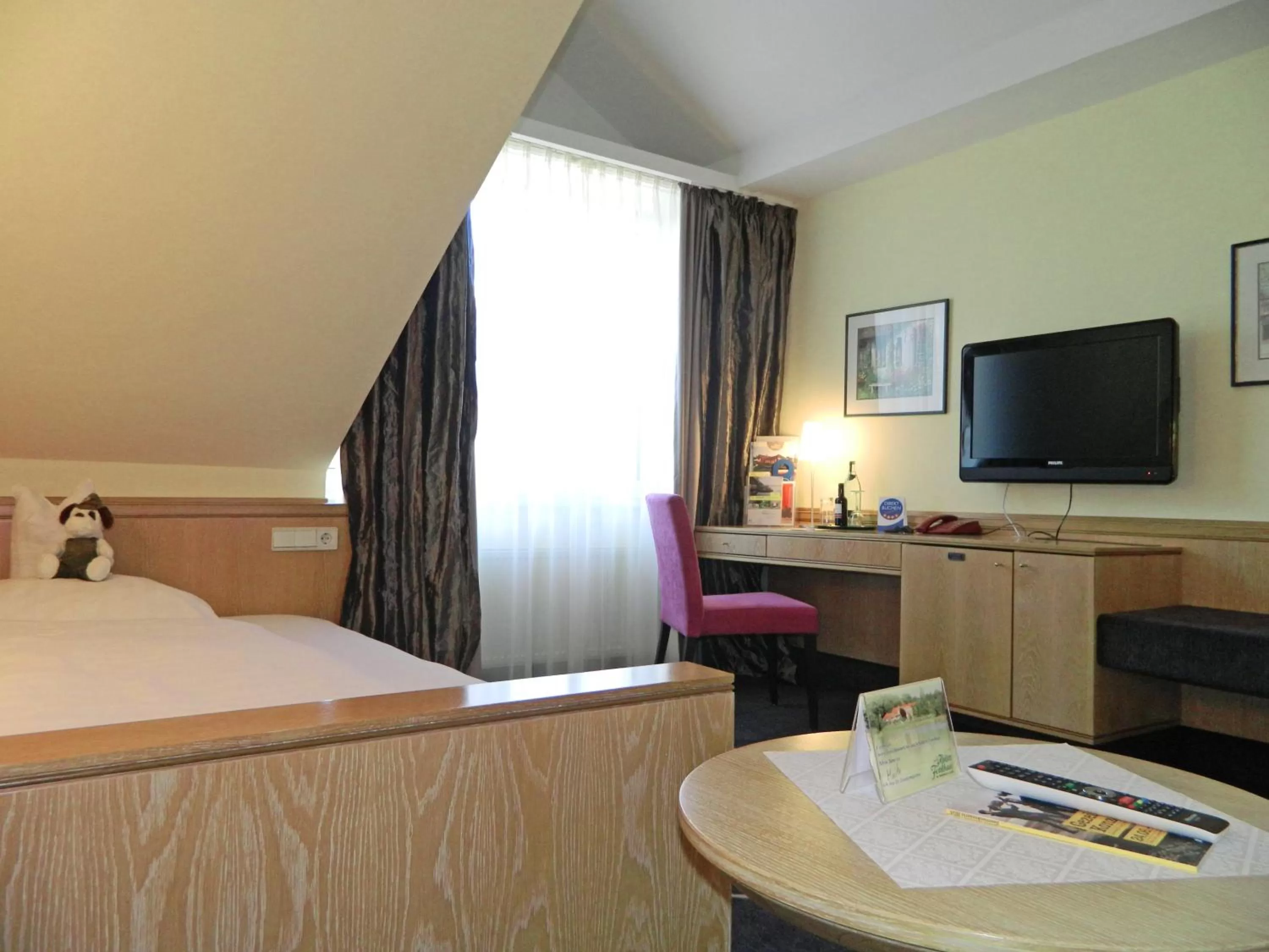 Bed in Köhlers Forsthaus Wellness & Genuss Hotel