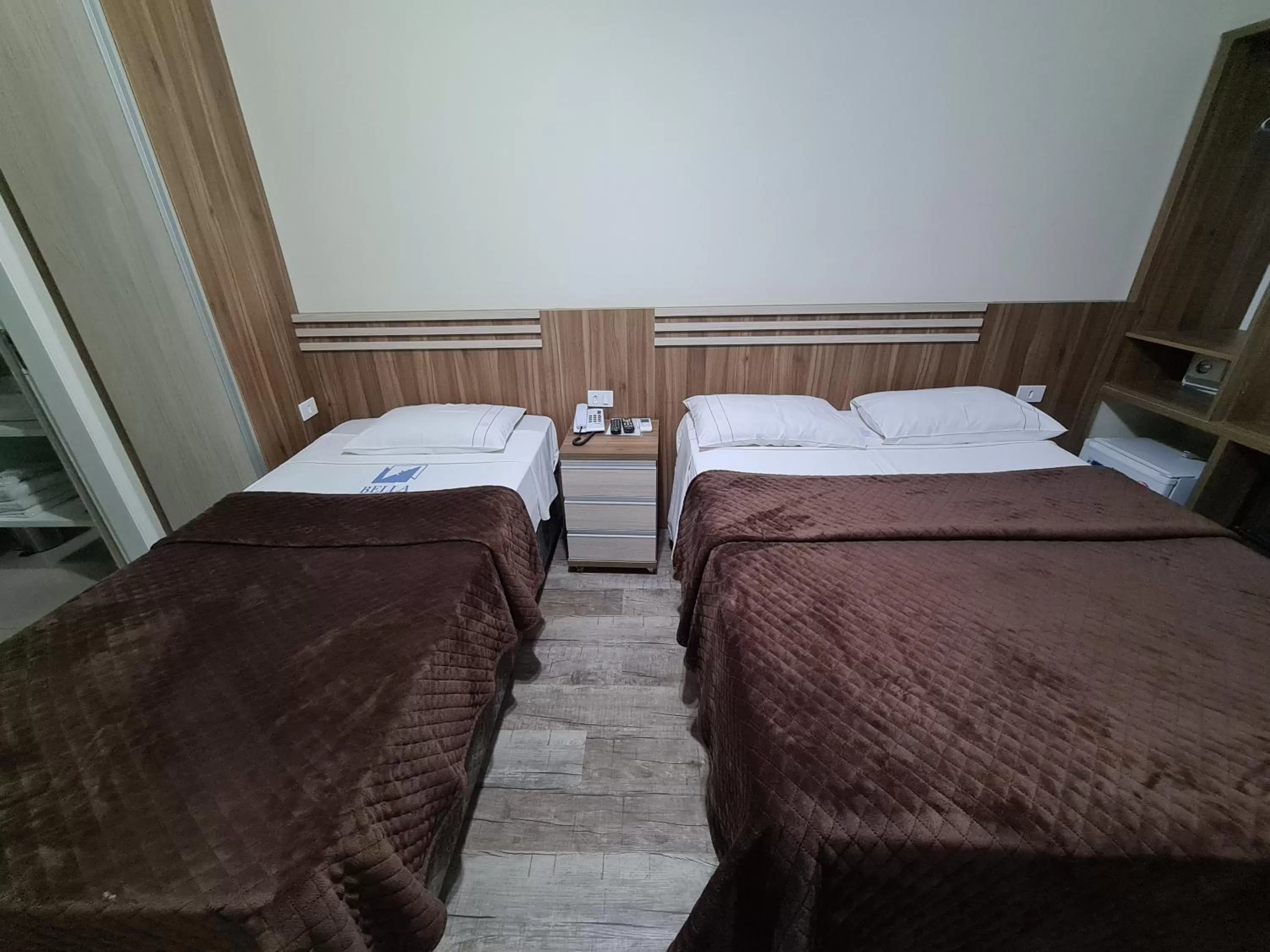 Bed in Bella Augusta Hotel