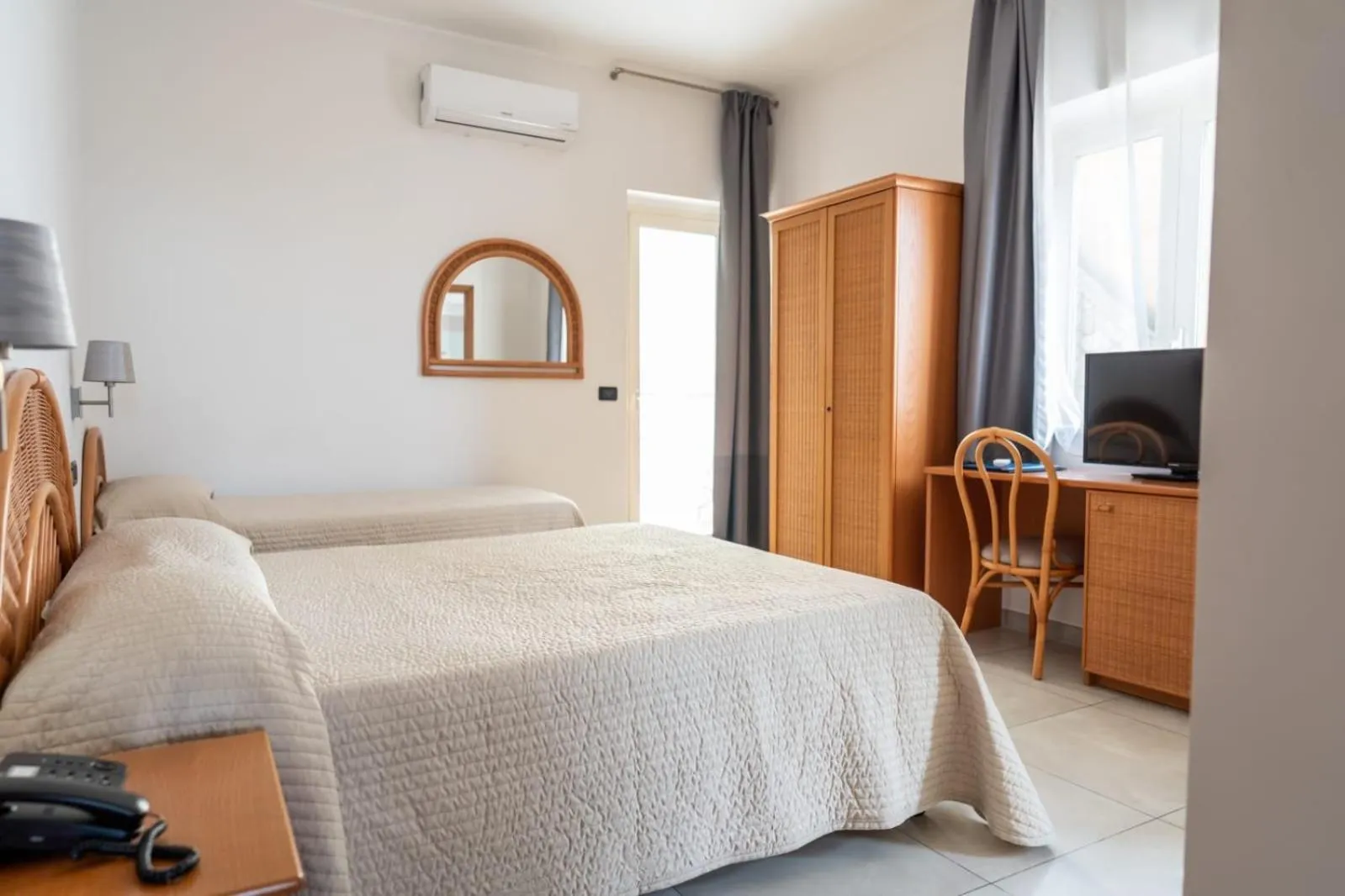 Bed in Hotel Corallo