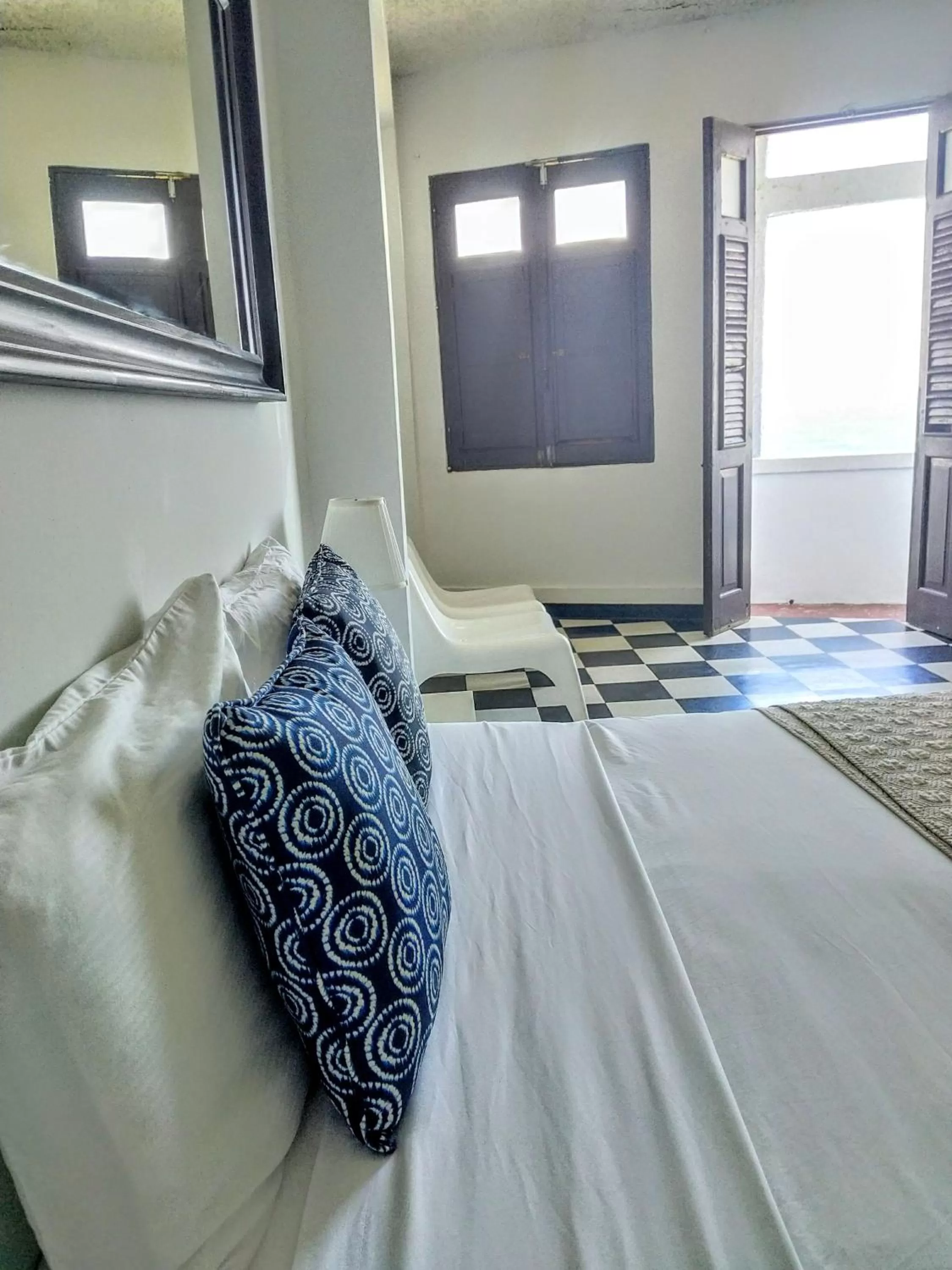 Bed in La Capitana Old San Juan Building