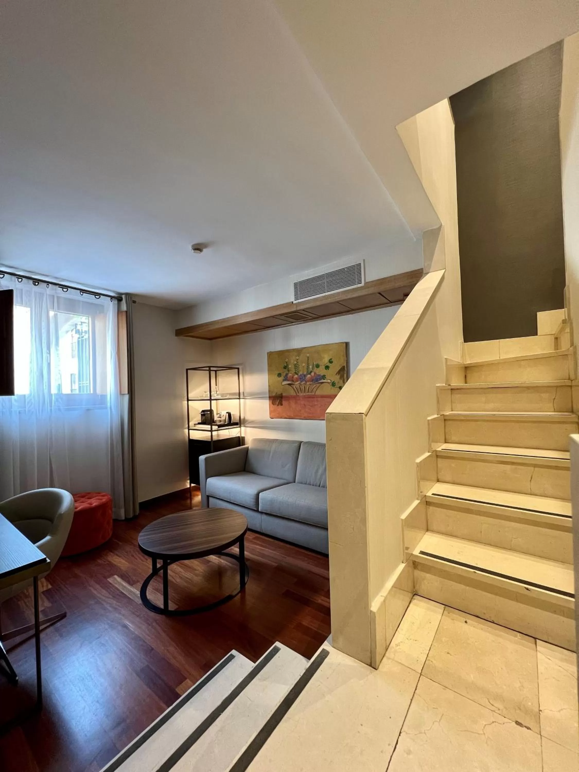 Seating area in NH Collection Salamanca Palacio de Castellanos