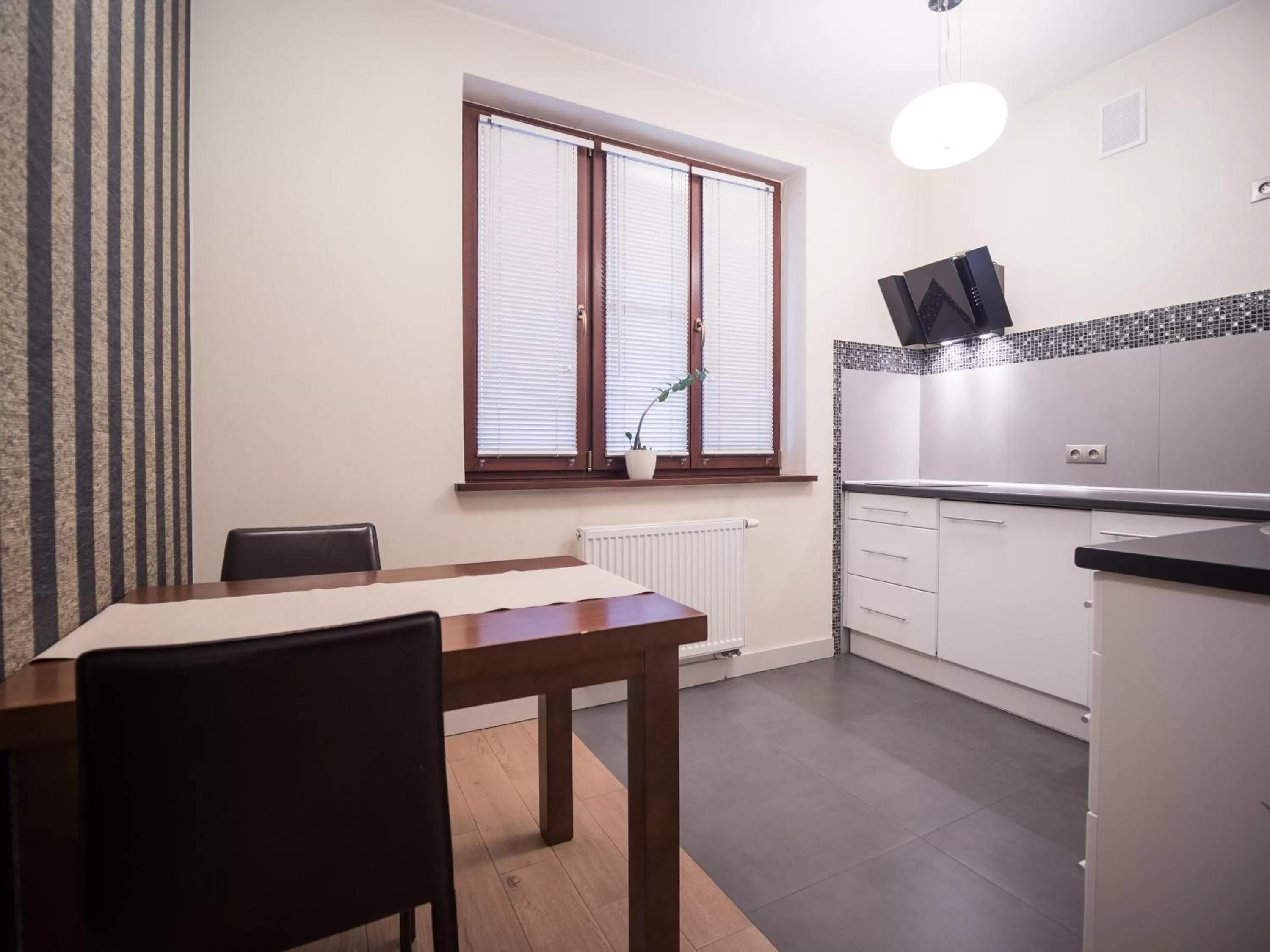 Kitchen or kitchenette in Hotel Miodowa