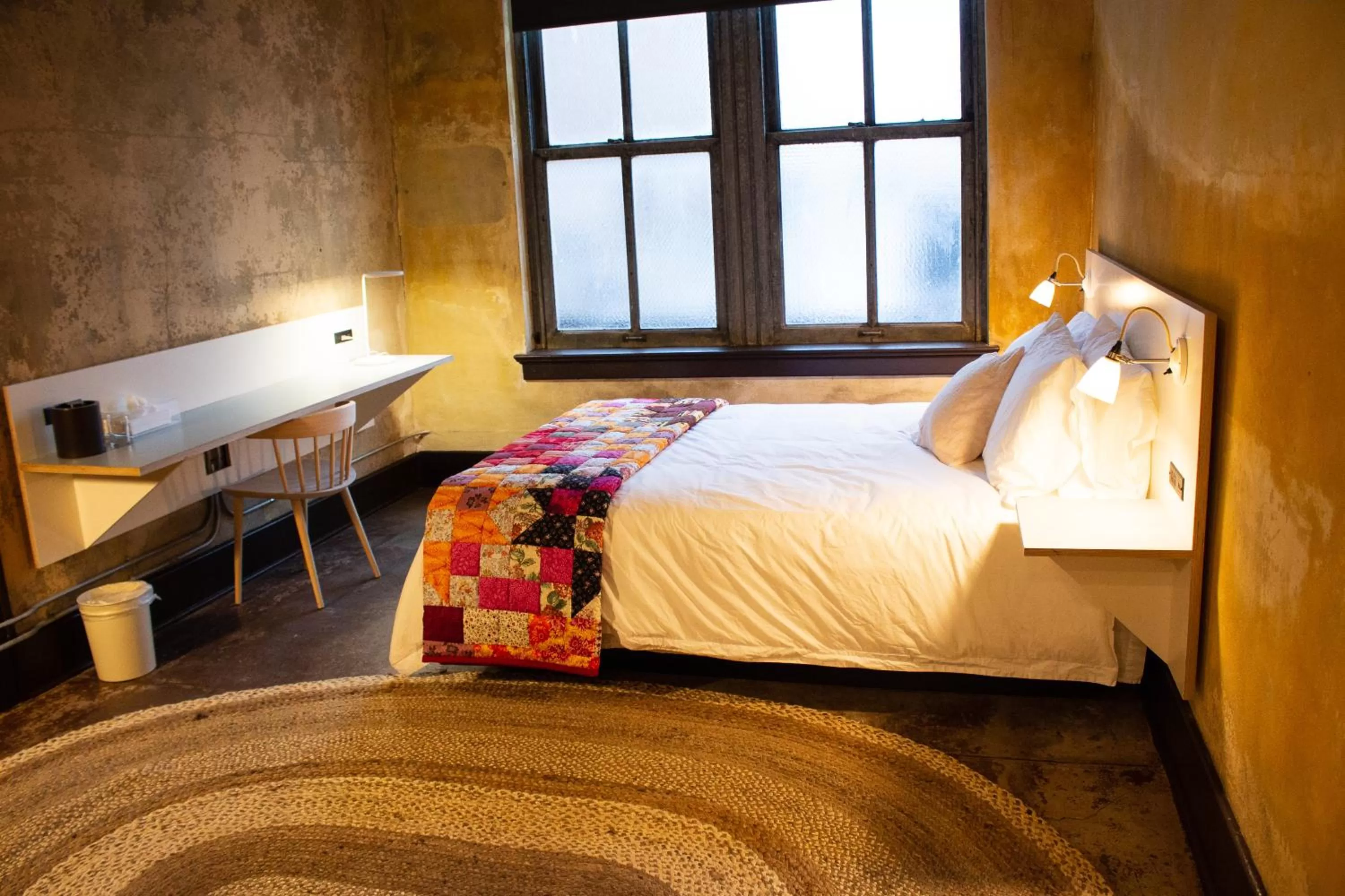 Bed in Travelers Hotel