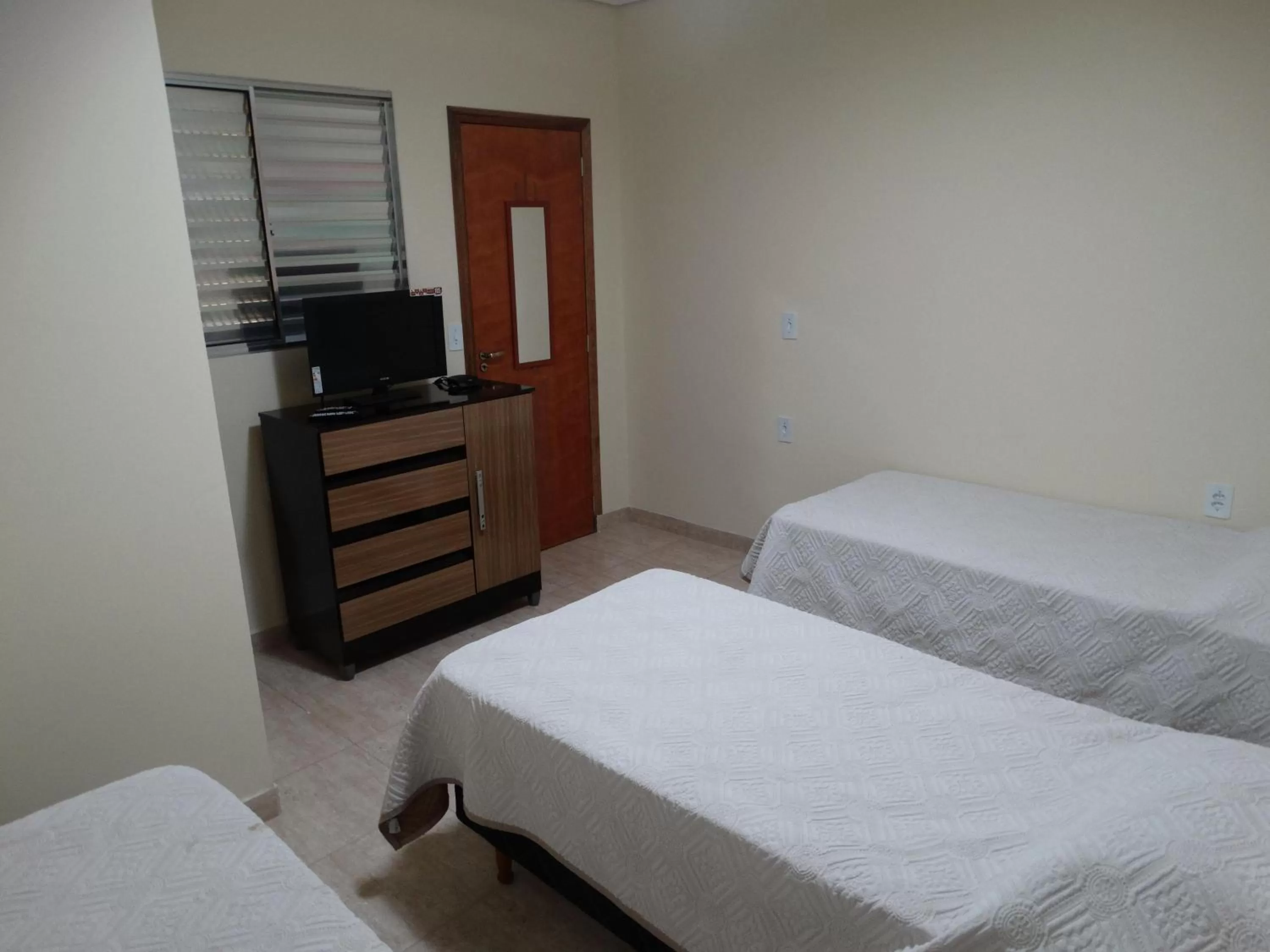 Photo of the whole room, Bed in Pousada F7
