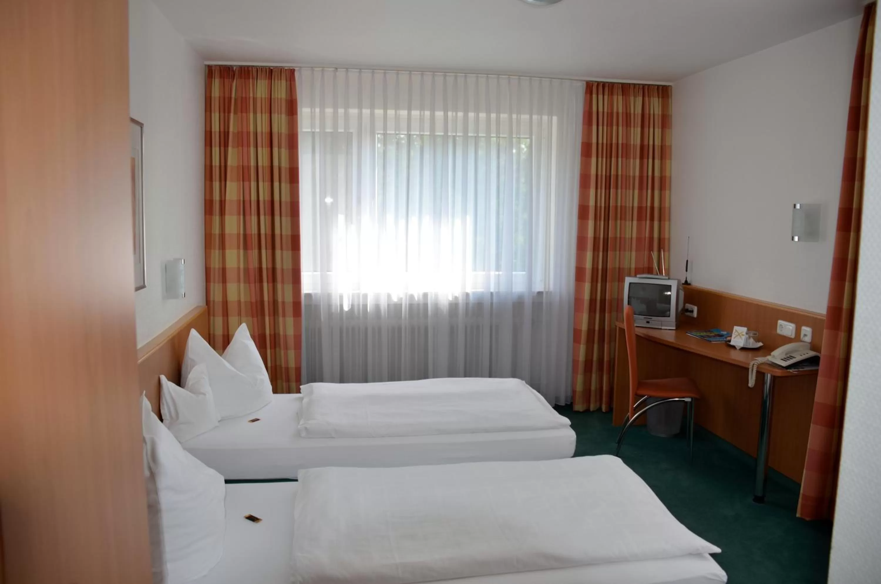 Photo of the whole room, Bed in Landhotel Sulzbacher Hof