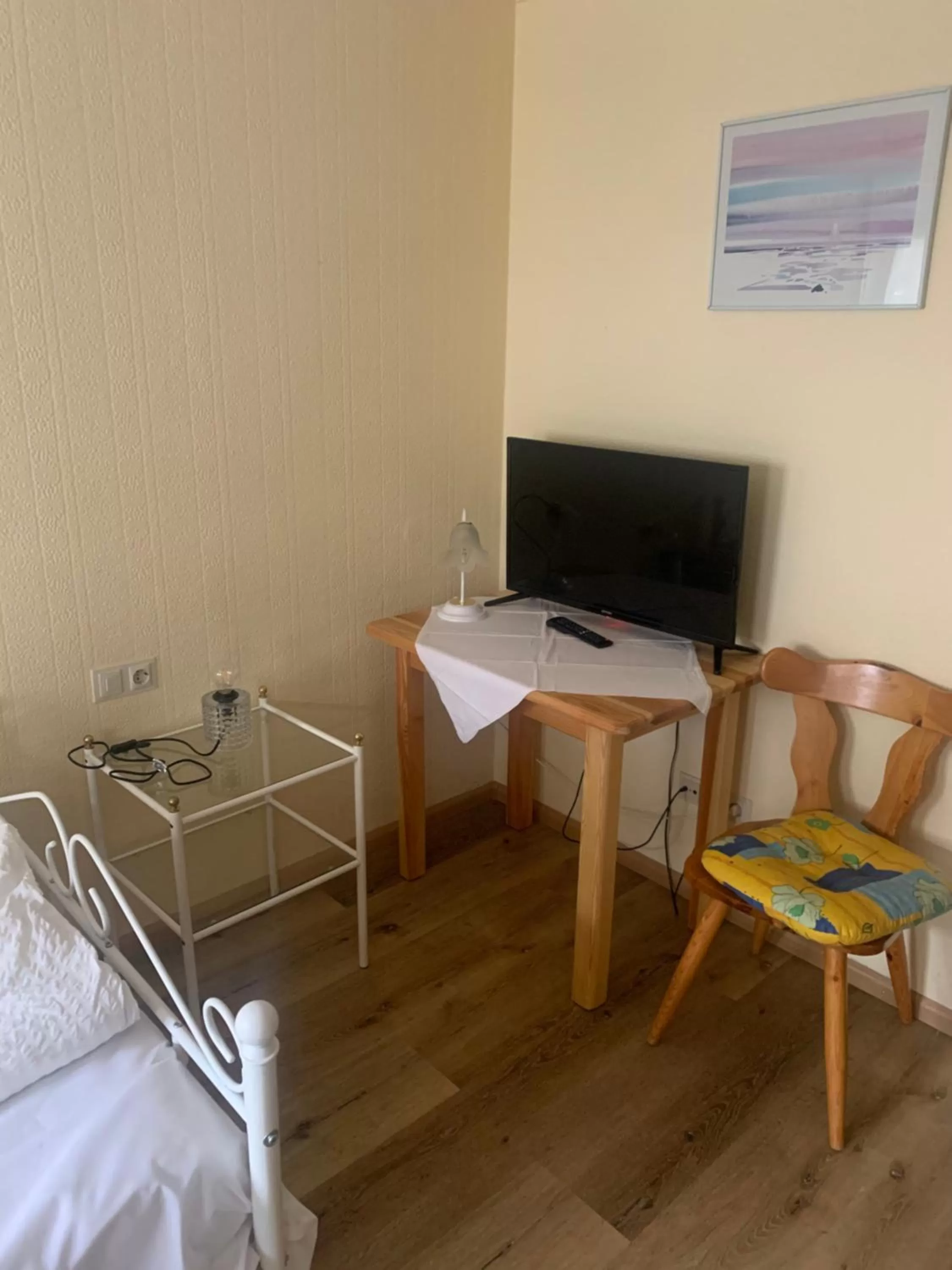 TV and multimedia, TV/Entertainment Center in Hotel Maien