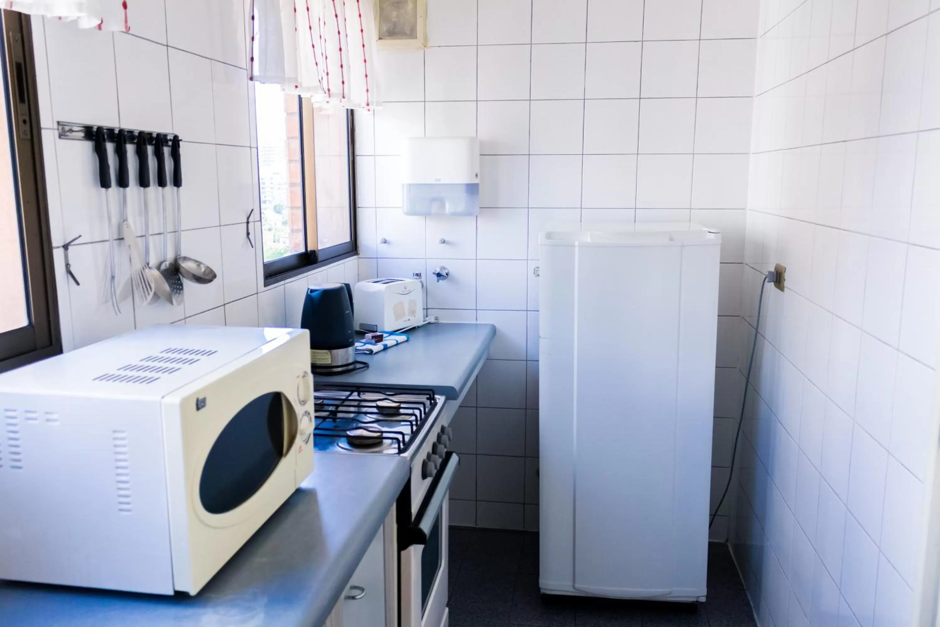 Kitchen or kitchenette in Alessandria Apart - Coronel Pereira