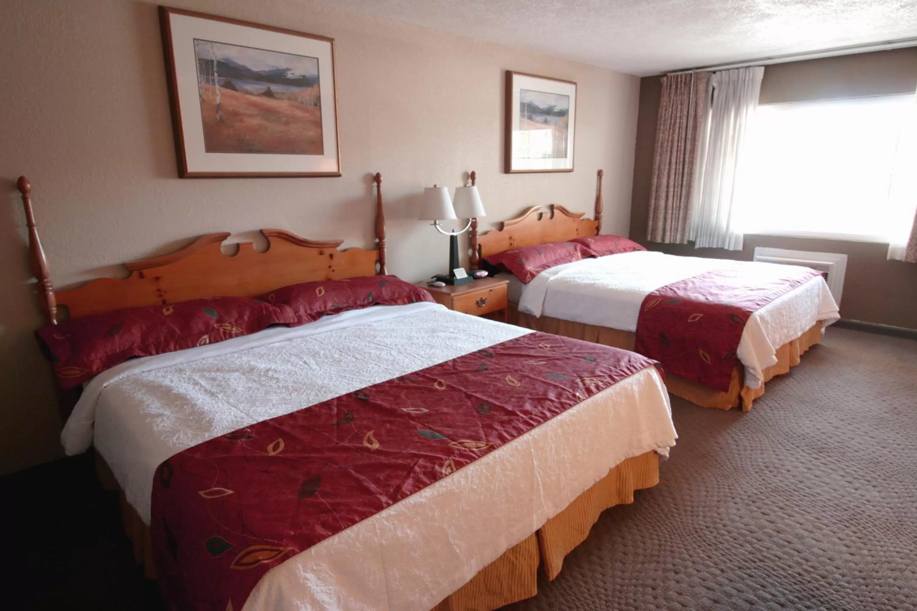 Bed in The Maverick Motel, Main Street USA Collection by PNW Hospitality