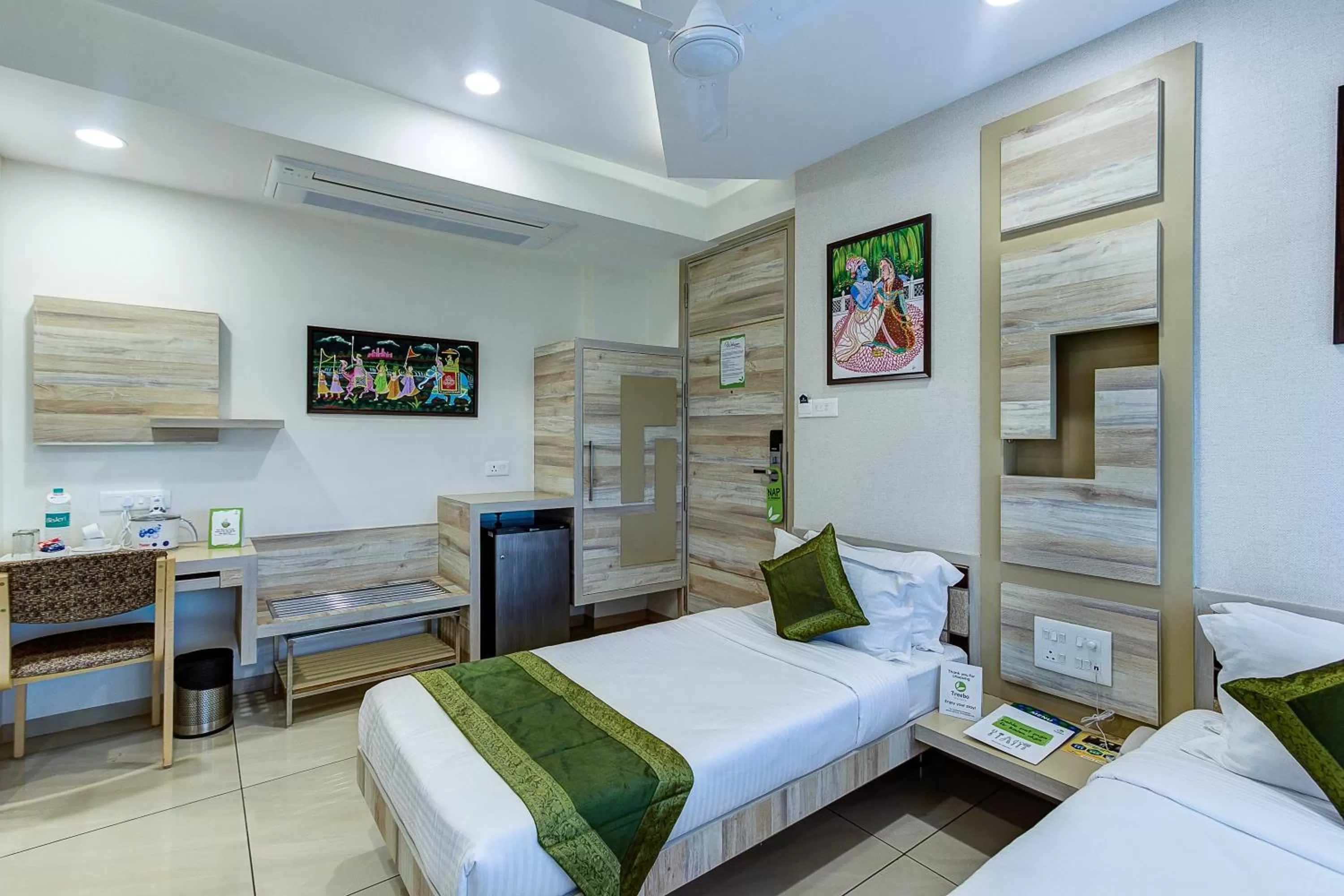 Bed in Treebo Daksh Residency