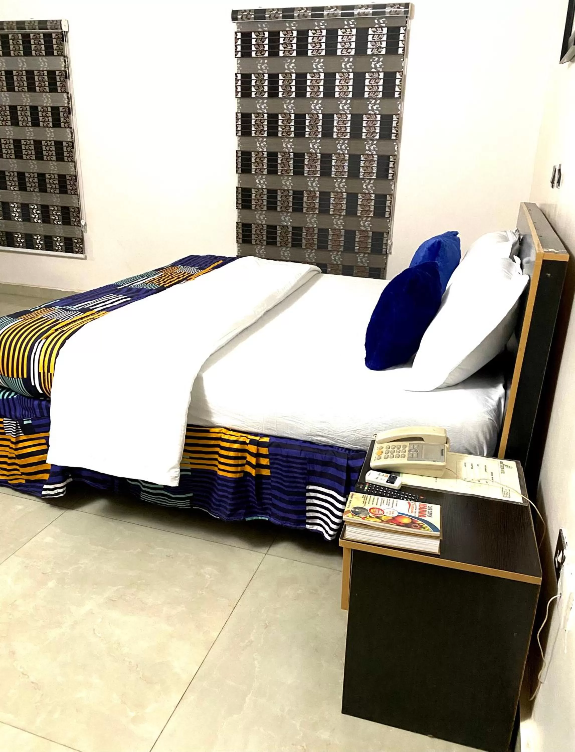 Bed in Nue-Crest Hotels & Suites