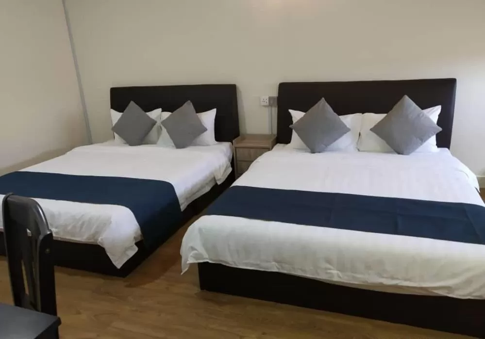 Bed in Star Seasons Hotel