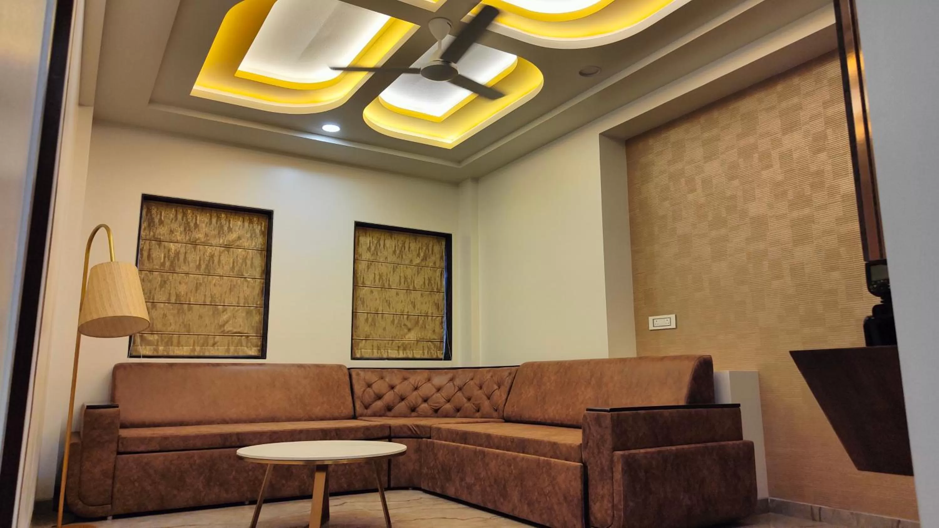 Living room in Four Petals Executive by LHMS