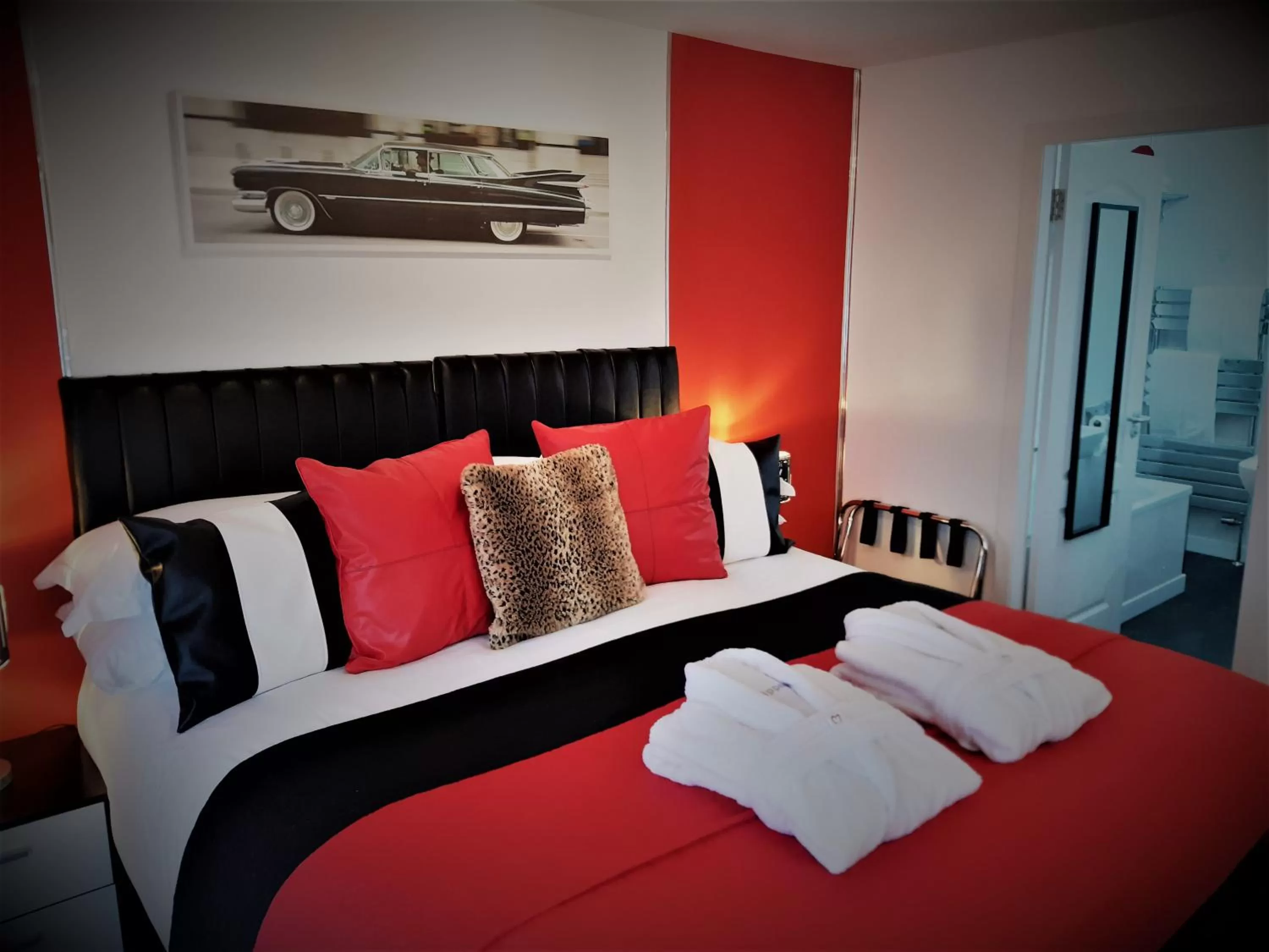 Bed in Cadillac Kustomz Hotel