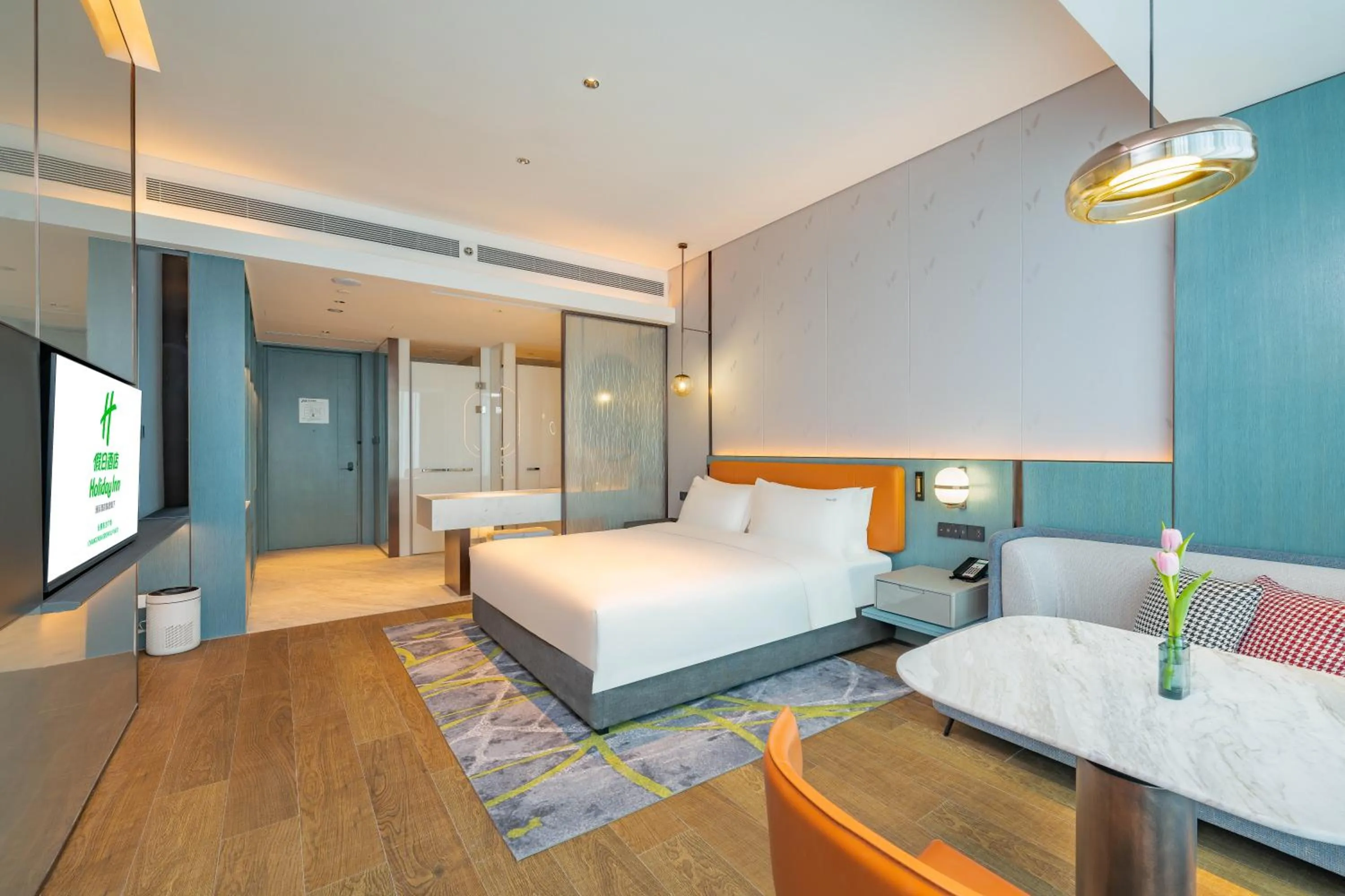 Communal lounge/ TV room, Bed in Holiday Inn Changchun Oriental Plaza by IHG