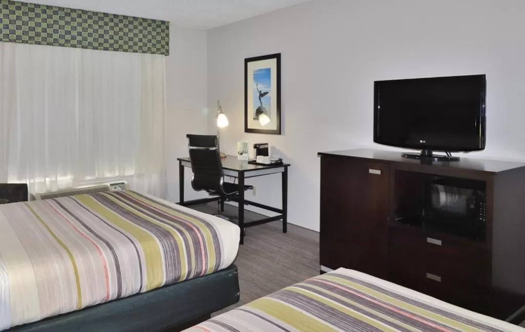 Queen Room with Two Queen Beds and Roll-In Shower - Non-Smoking in Country Inn & Suites by Radisson, Jacksonville, FL
