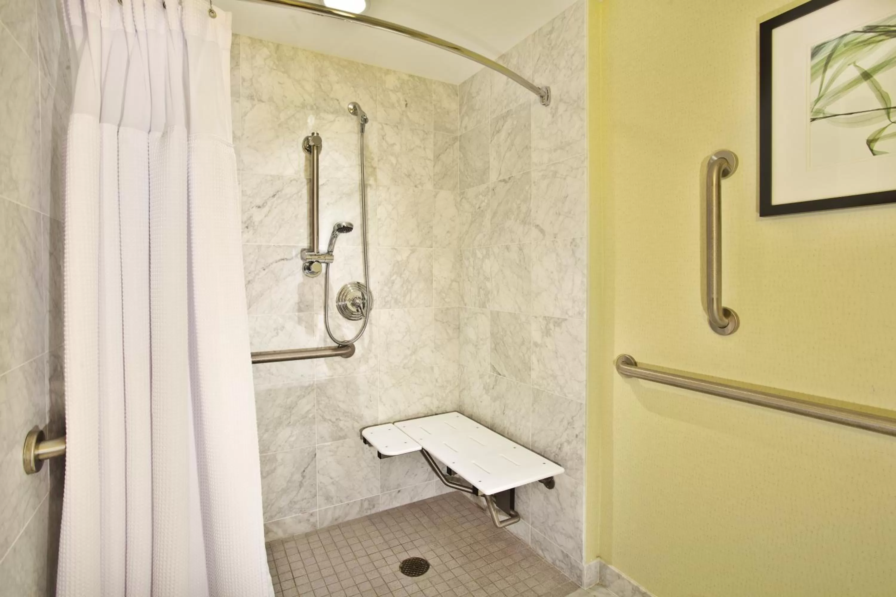 King Room with Roll-In Shower - Hearing Accesible  in Crowne Plaza Lansing West, an IHG Hotel