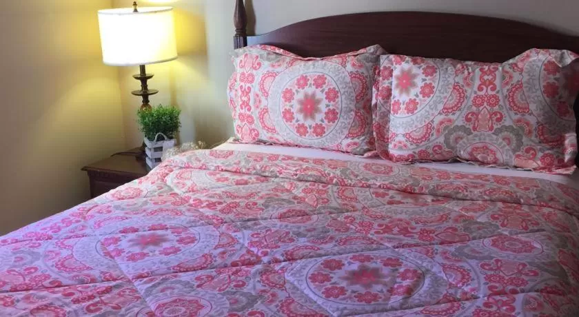 Bed in The Falls Family Lodge