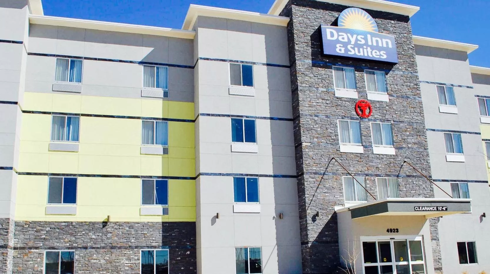 Property building in Days Inn & Suites by Wyndham Lubbock Medical Center