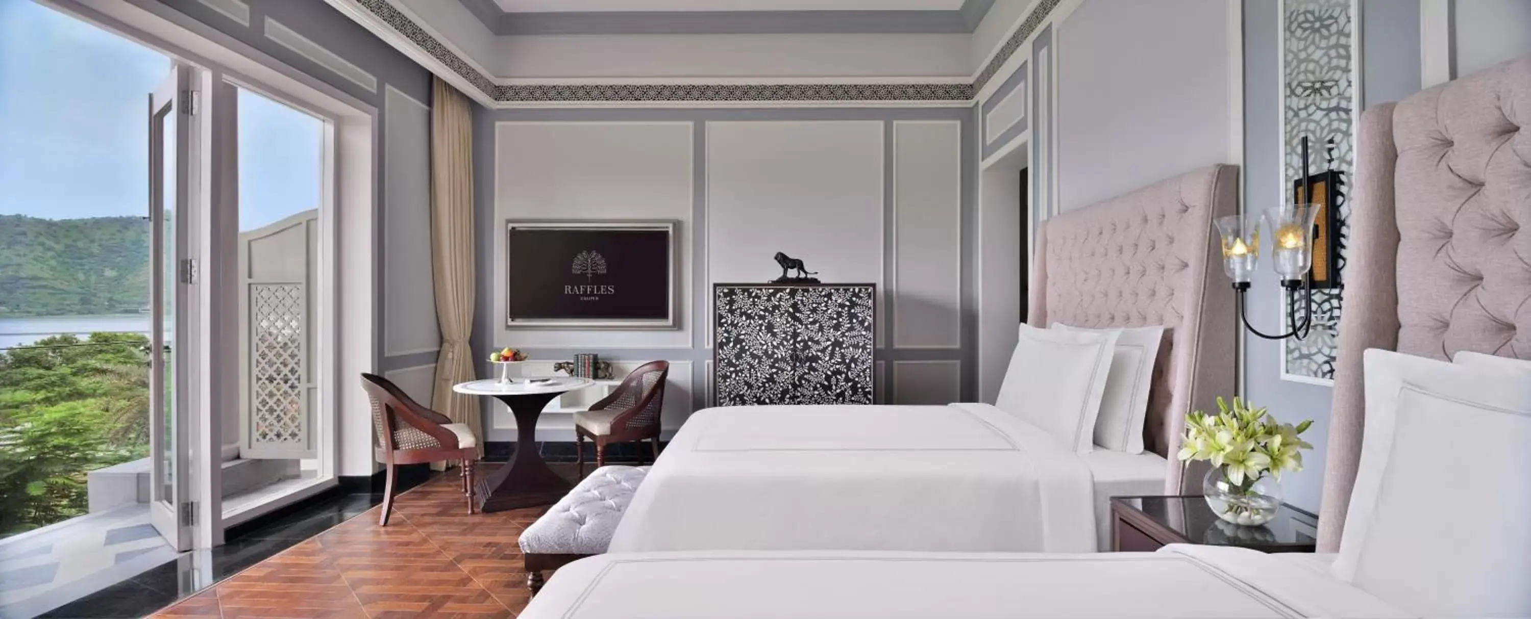 Flamingo Signature Room with Garden Twin Bed - 15% discount on Food & Soft Beverage and Spa, 4 pieces laundry once per stay in Raffles Udaipur Flamingo Signature Room with Garden Twin Bed - 15% discount on Food & Soft Beverage and Spa, 4 pieces laundry once per stay in Raffles Udaipur