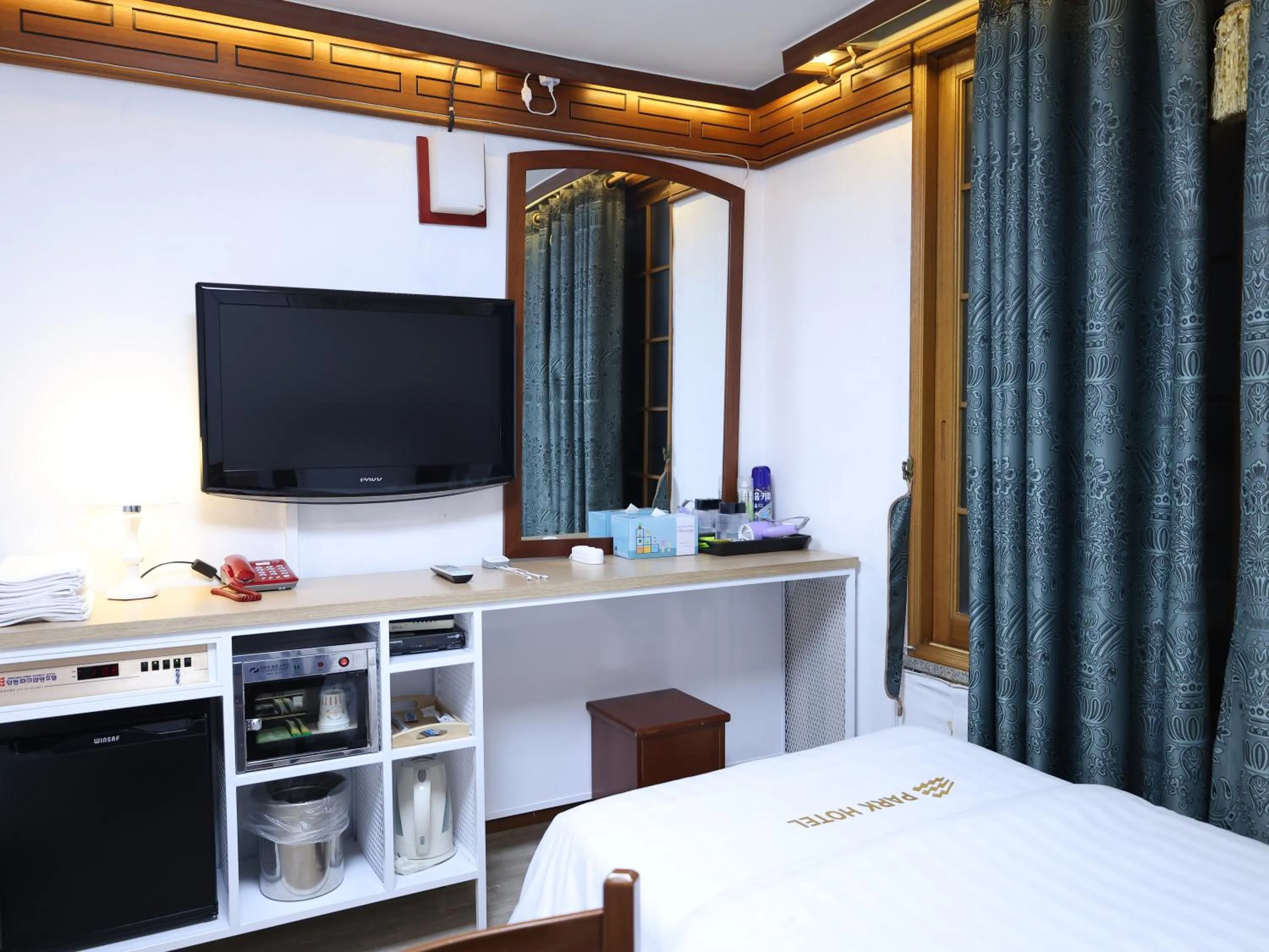 Bed in Goodstay Andong Park Hotel