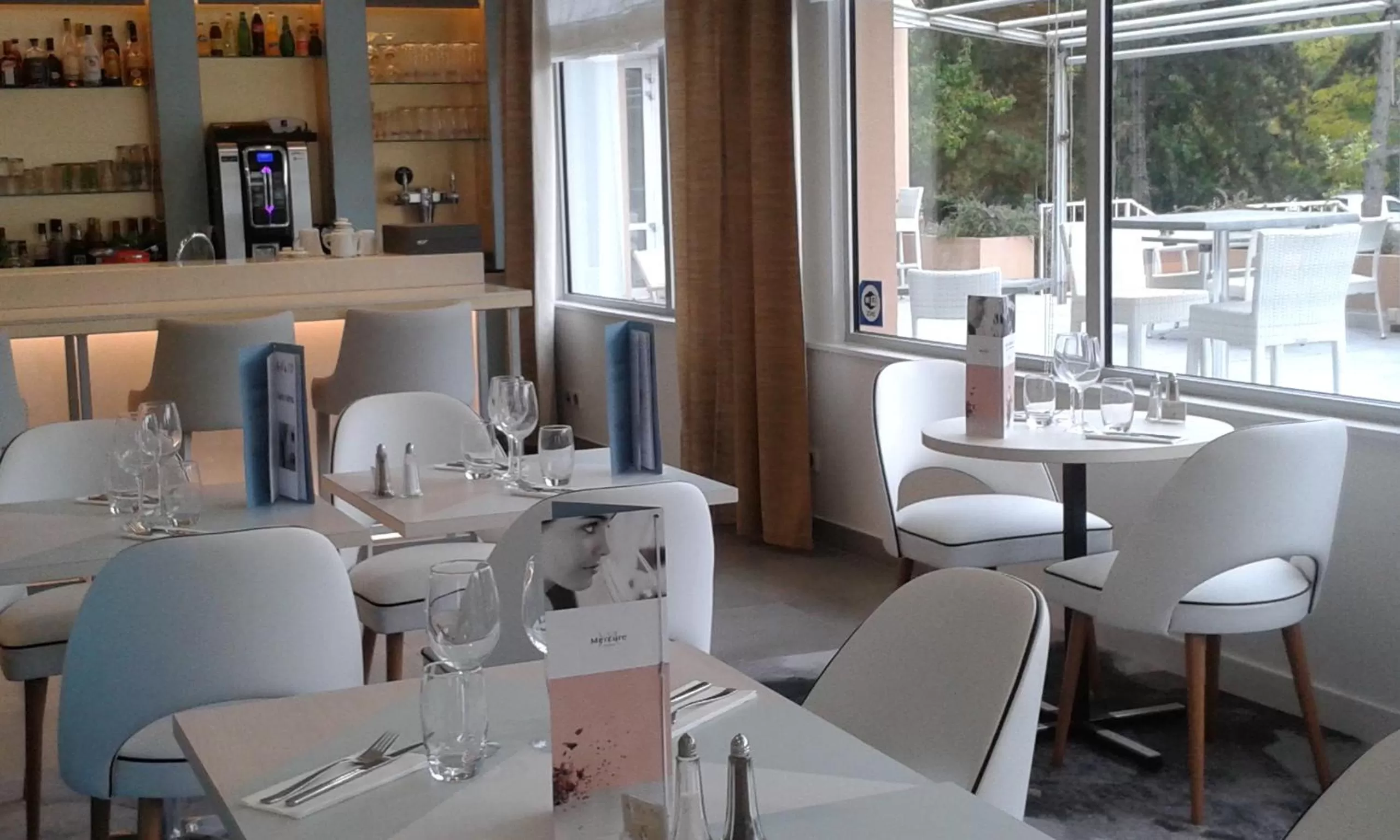 Dining area in Hôtel Mercure Mâcon Bord de Saône