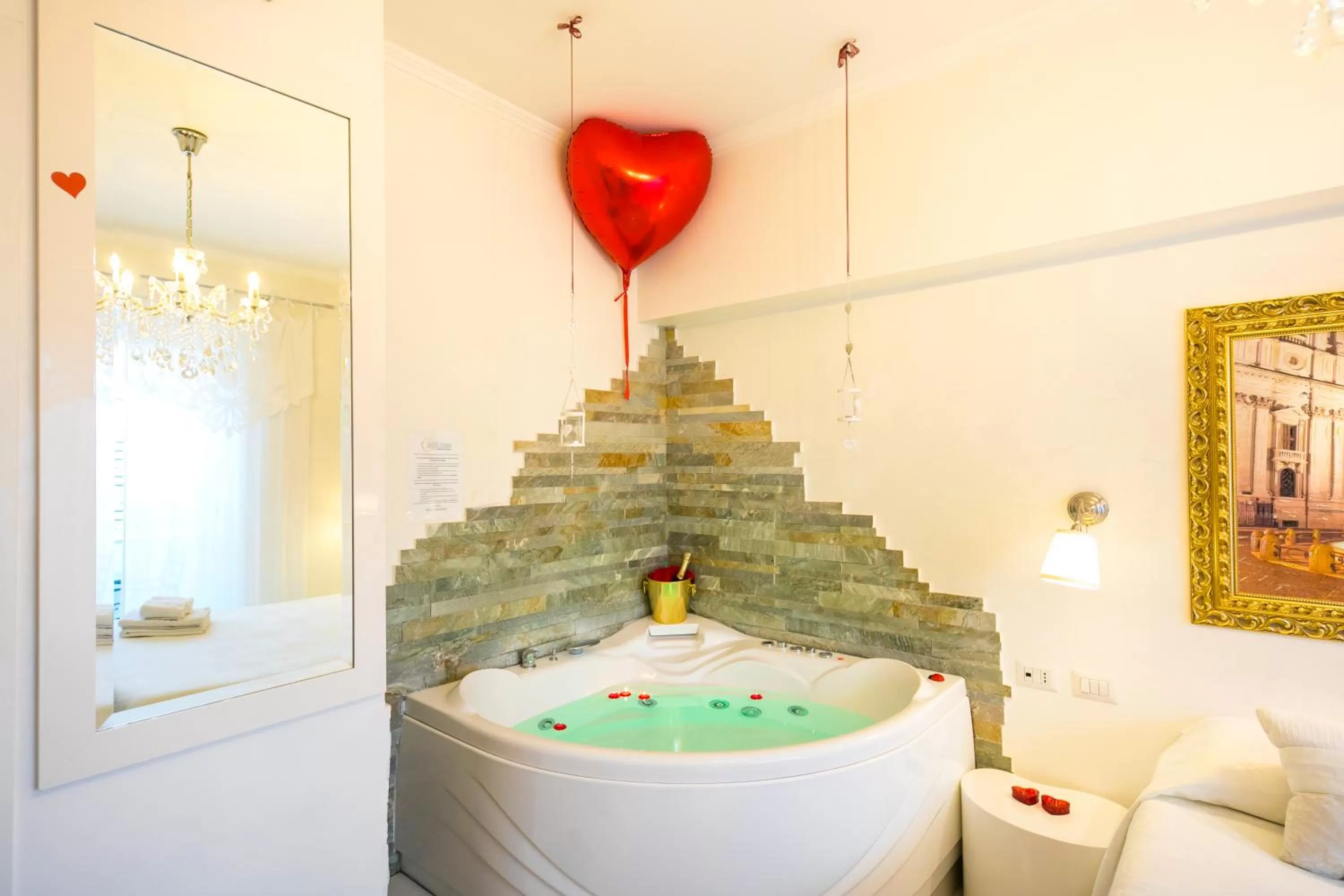 Photo of the whole room in Suites Roma Tiburtina