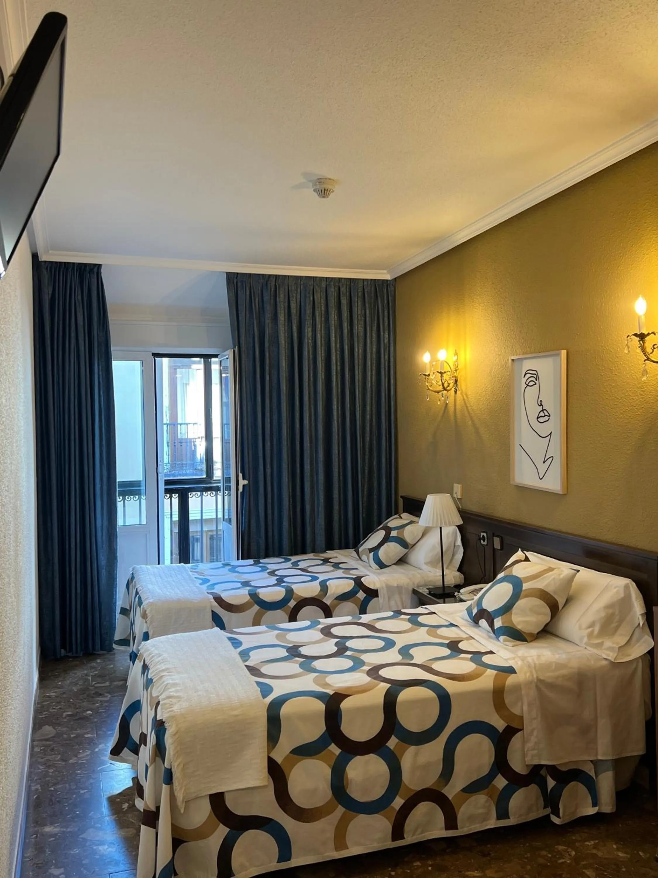 Photo of the whole room, Bed in Hostal Sonsoles Madrid-Centro