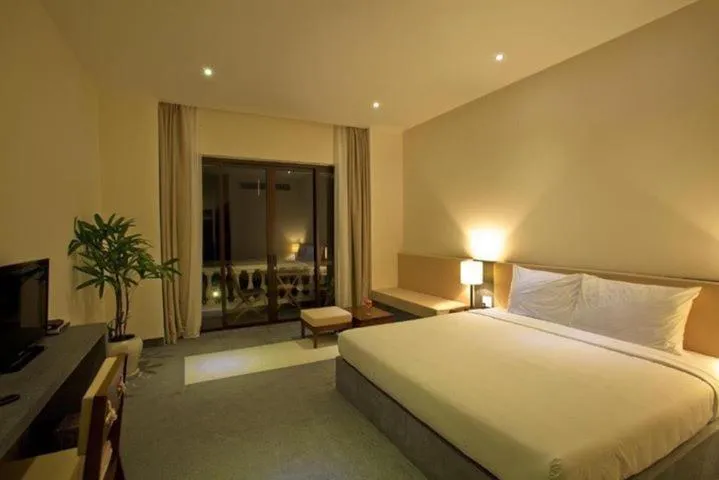 Bed in Palm View Villa