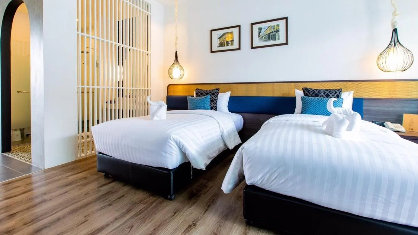 Bed in Chaanburi Boutique Resort