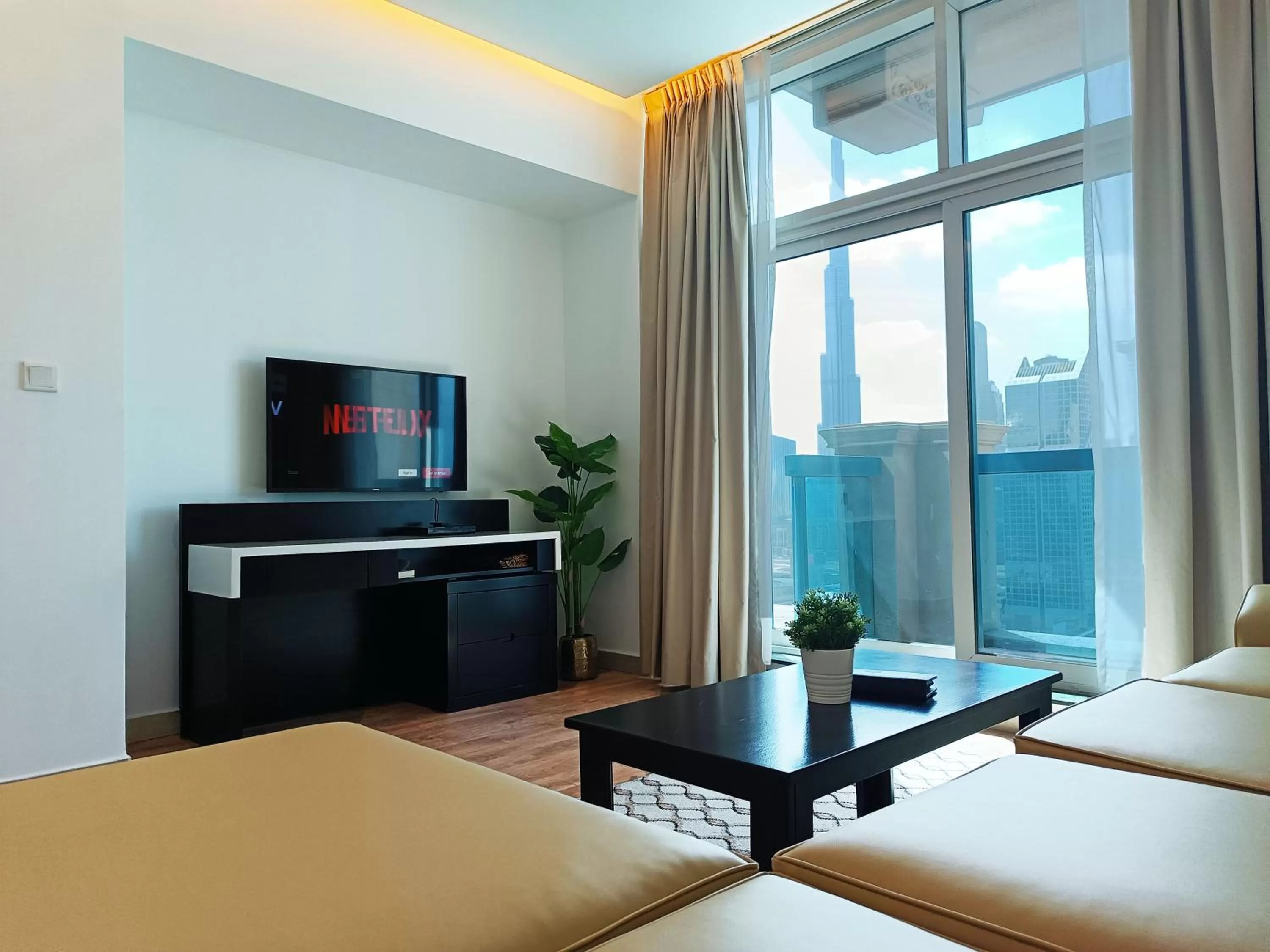 Seating area, Bed in Emirates Grand Hotel