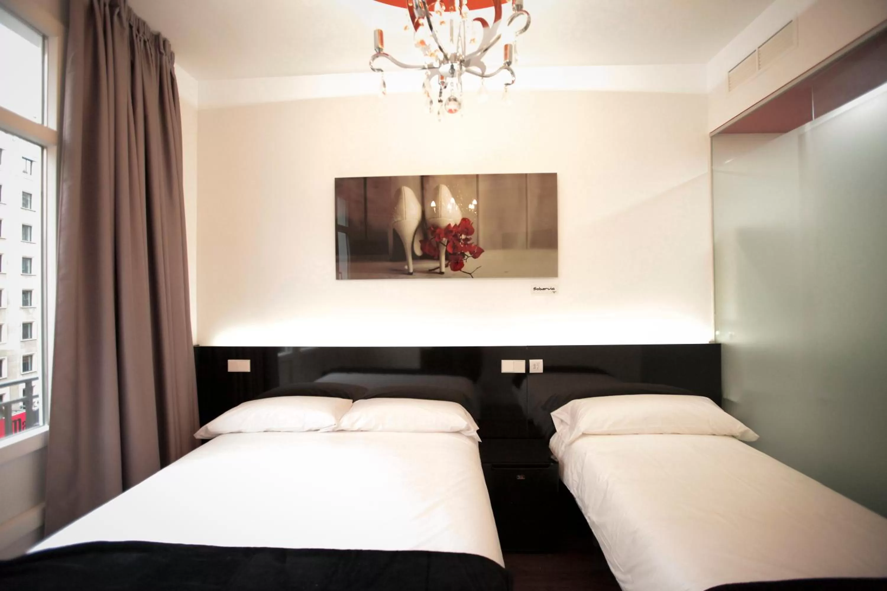 Decorative detail, Bed in Vitium Urban Suites
