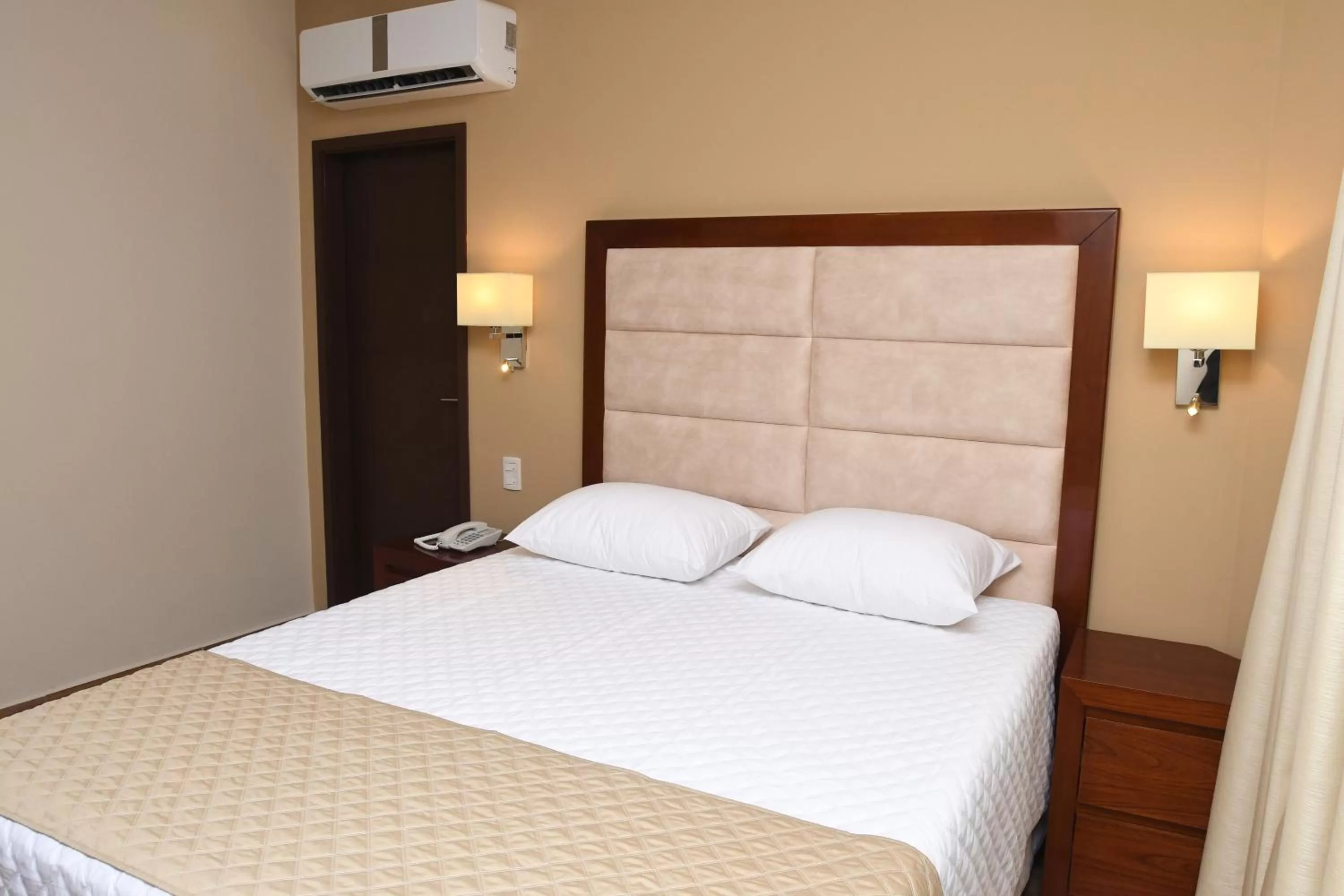 Bed in Taos Apart Hotel