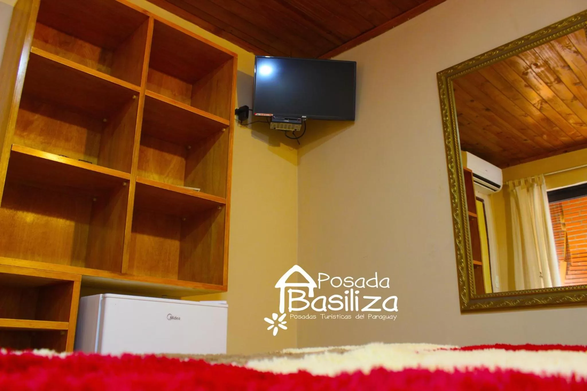 Photo of the whole room in Posada Basiliza, Encarnación PY