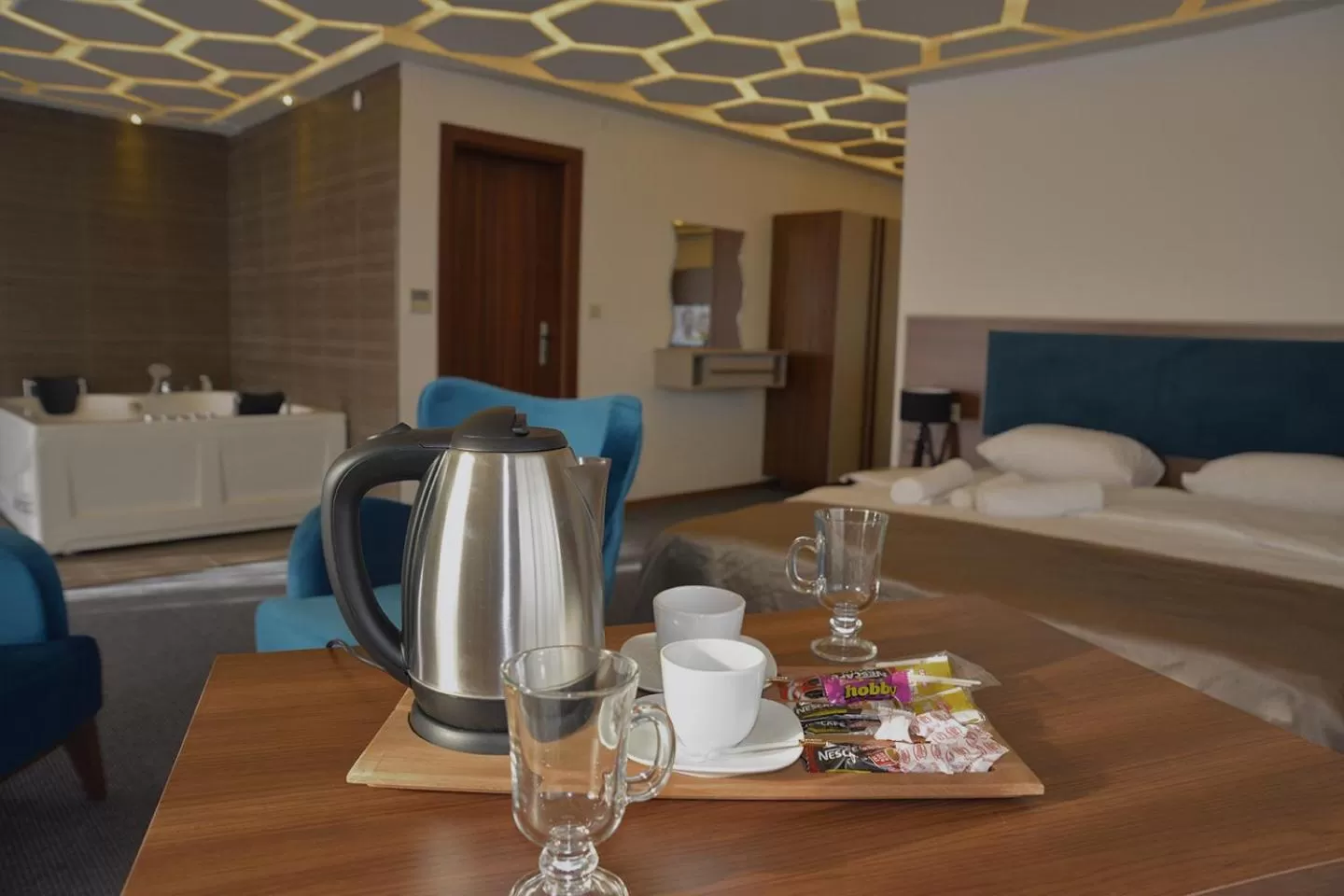 Bed in TEVETOGLU HOTEL