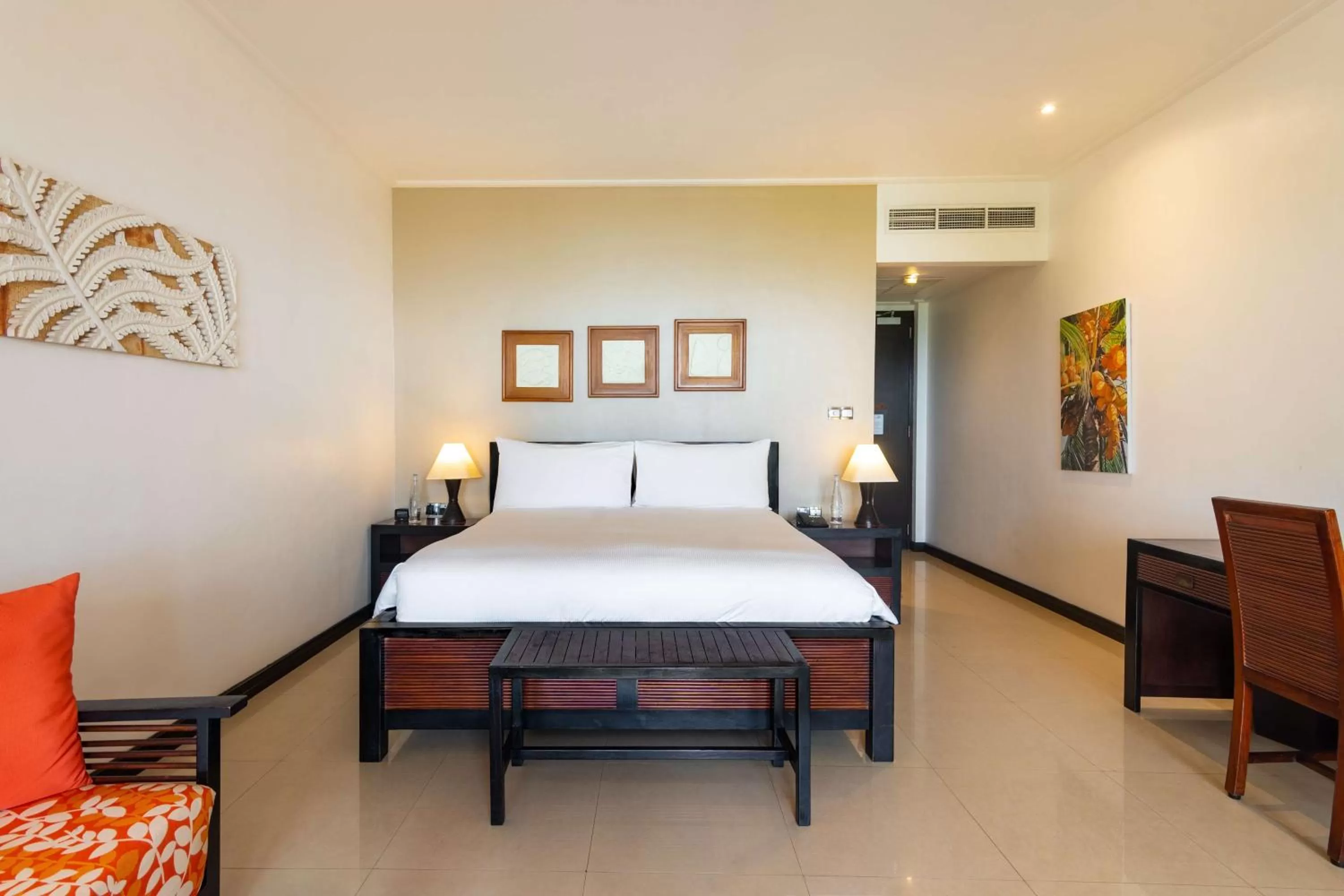 Bed in DoubleTree by Hilton Seychelles Allamanda Resort & Spa