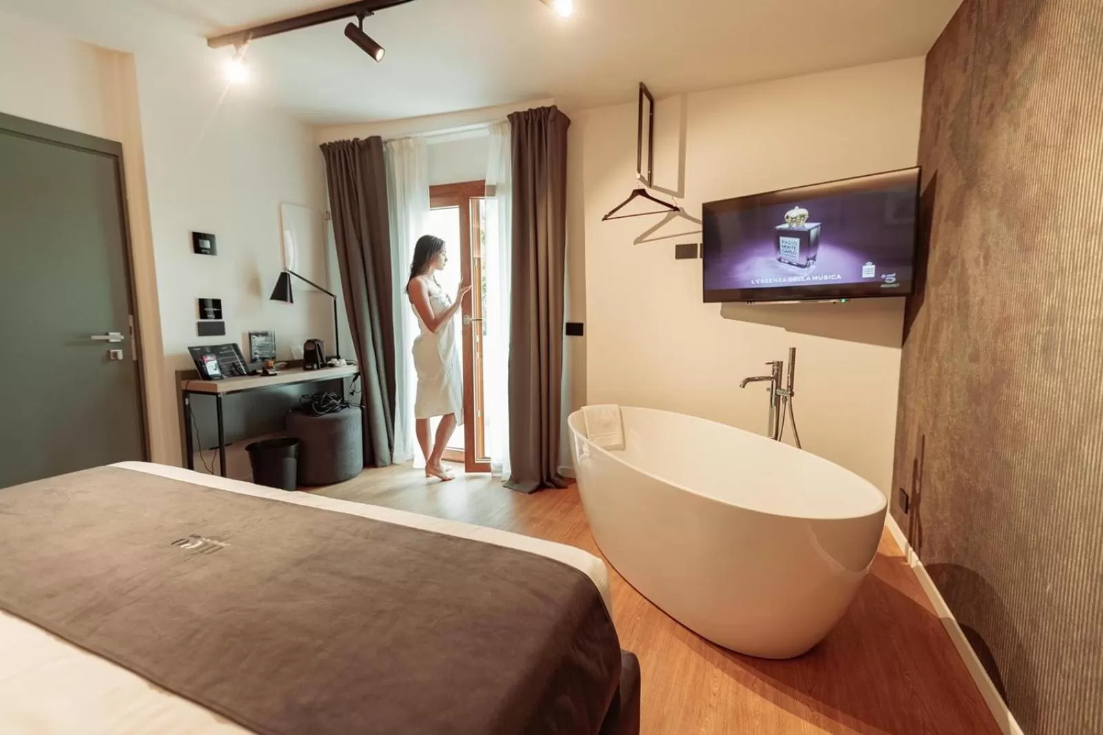 Bed in Meg Lifestyle Hotel & Apartaments