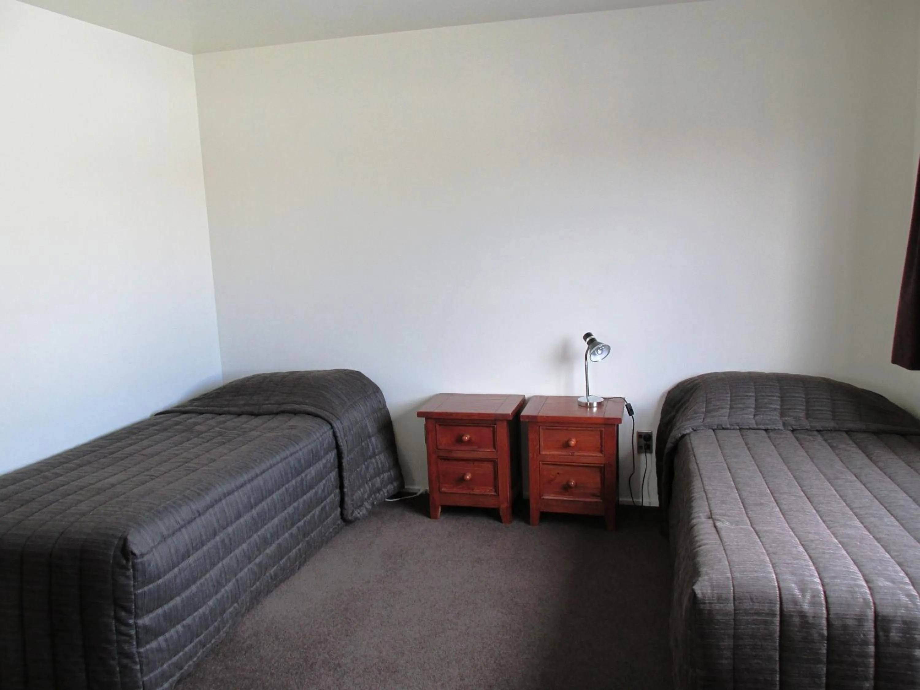 Bed in Dunedin Holiday Park