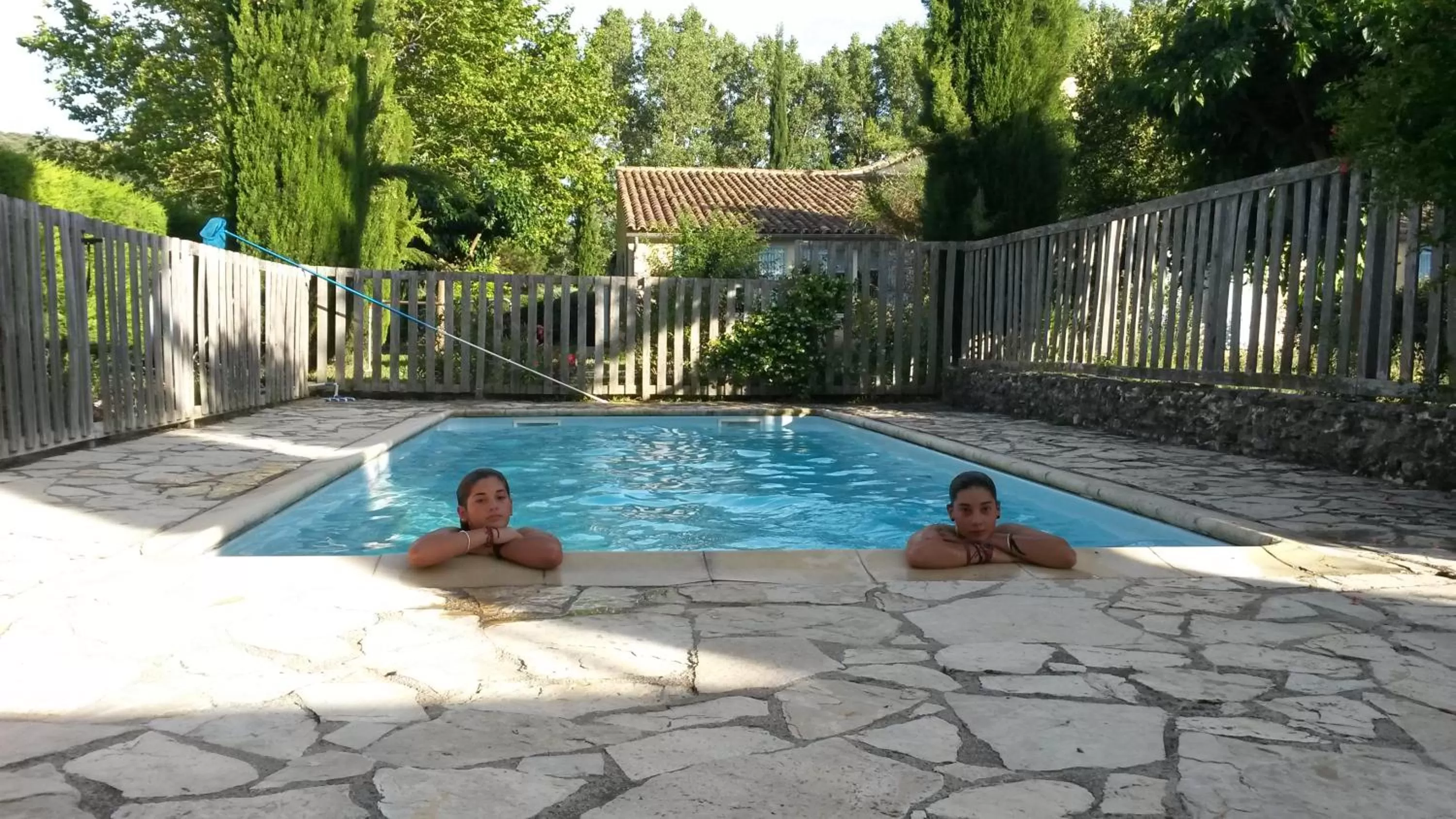 Pool view in Chambres d'Hôtes Aux Tournesols