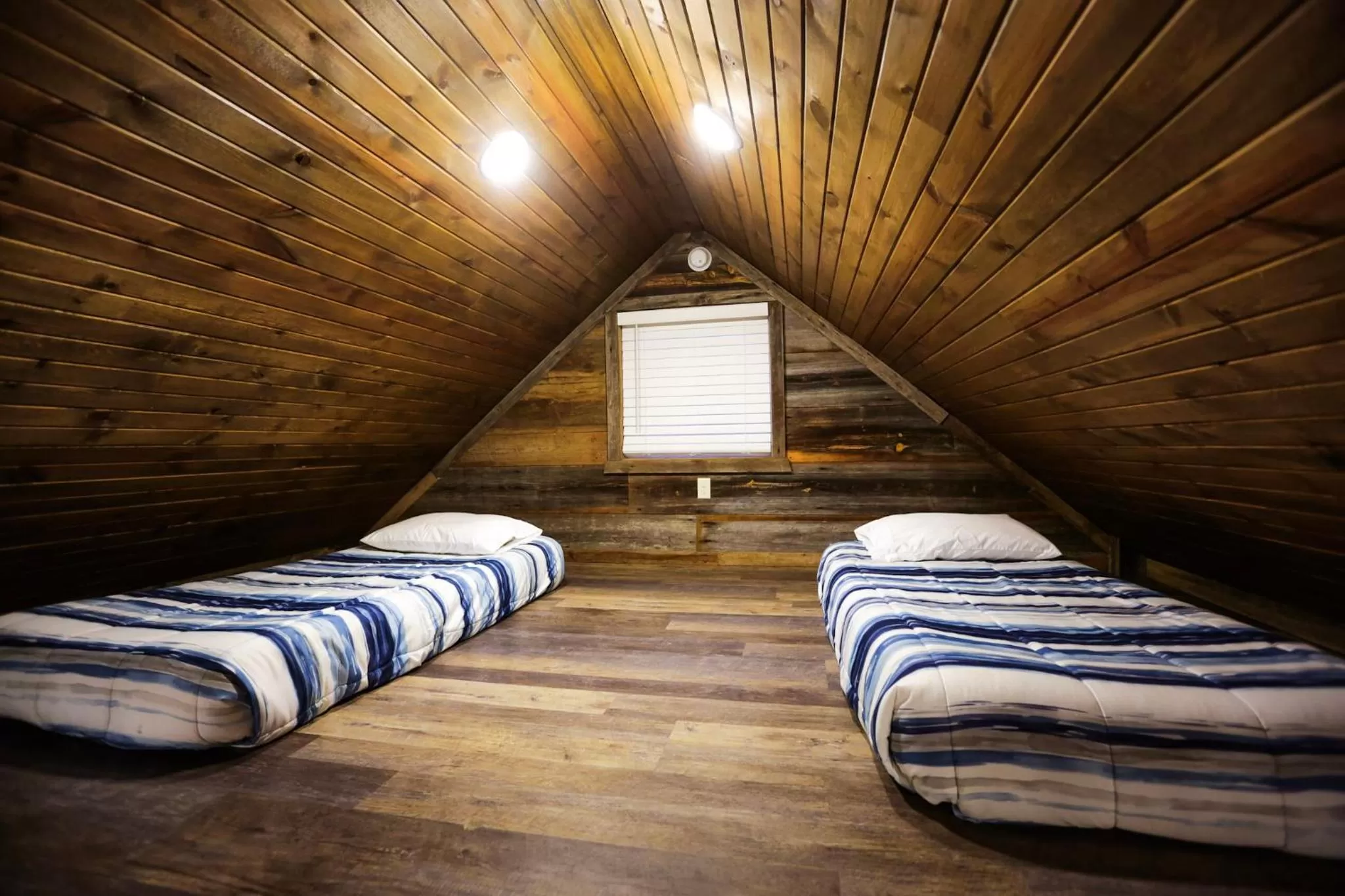 Bedroom, Bed in Knotty Squirrel Cabins