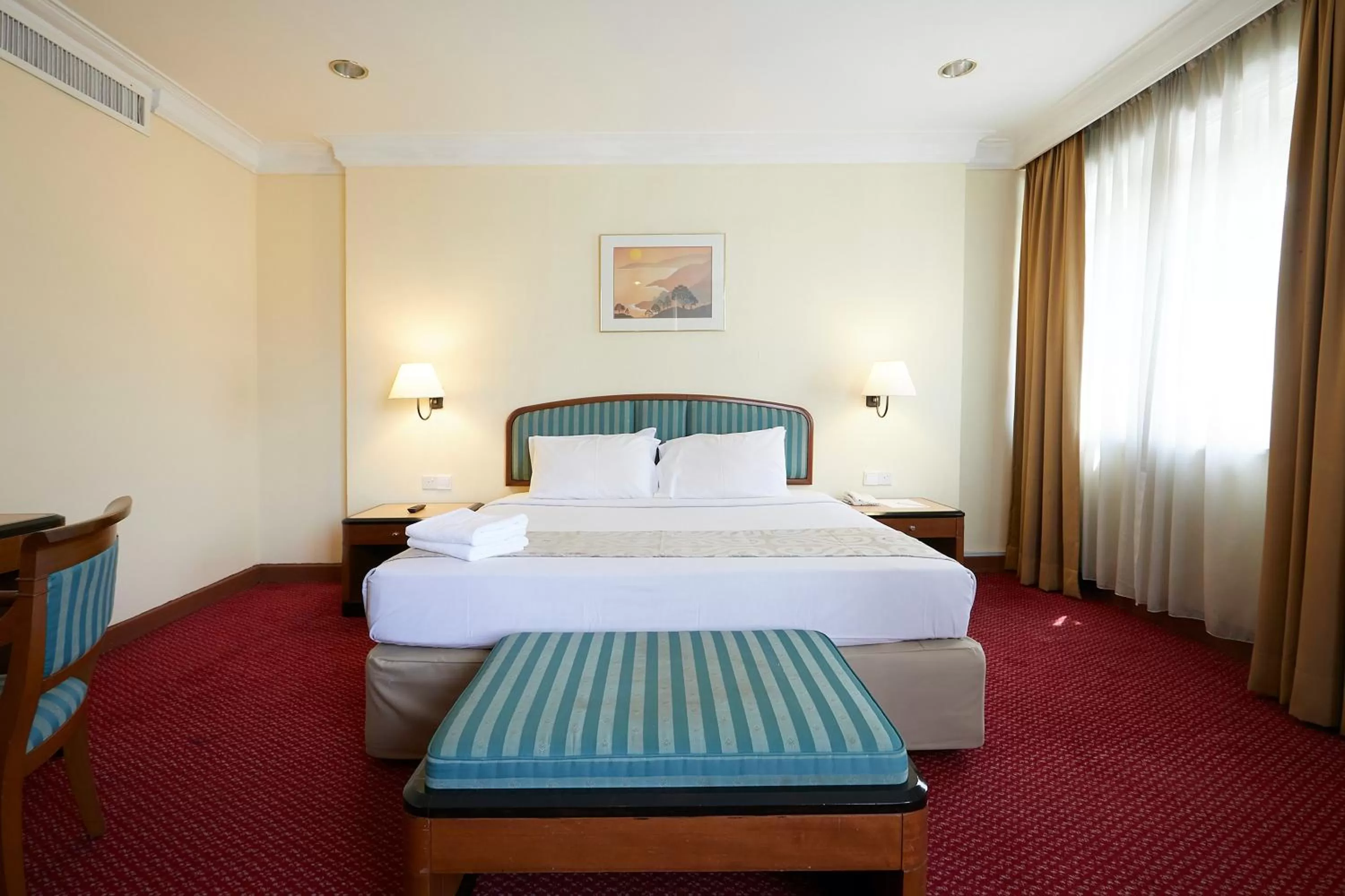 Bed in Grand Pacific Hotel PWTC