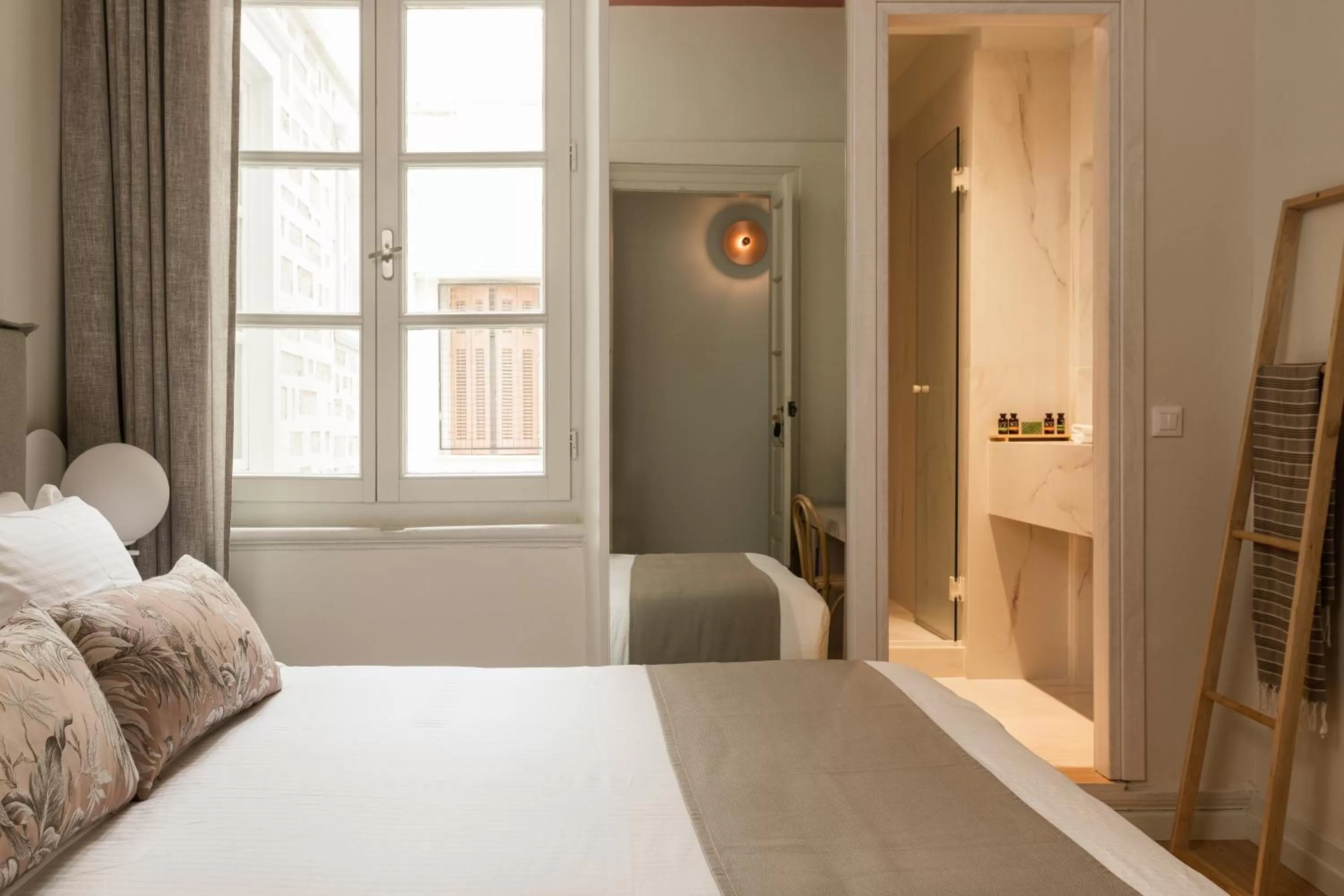 Bed in SYROS SOUL LUXURY SUITES