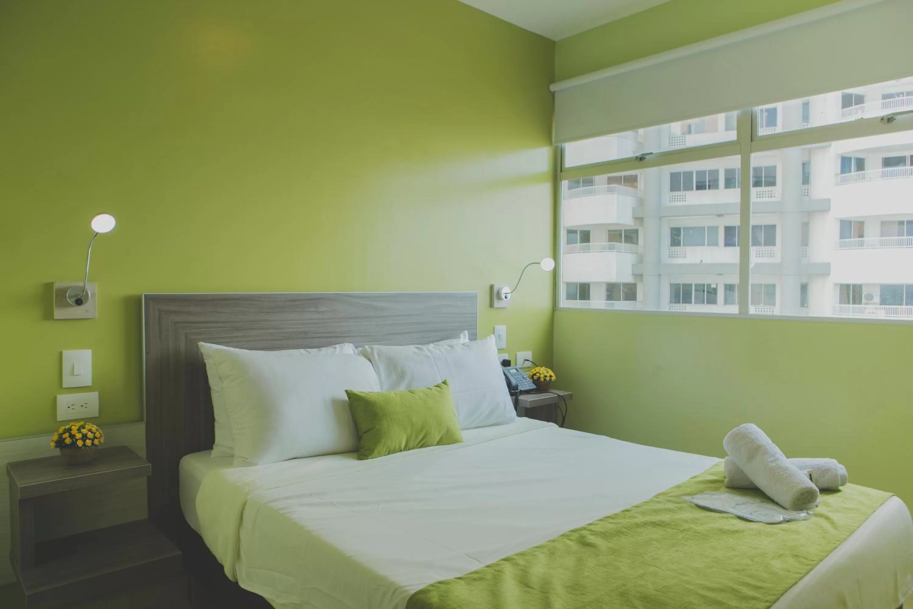 Bedroom in Hotel Aixo Suites By GEH Suites