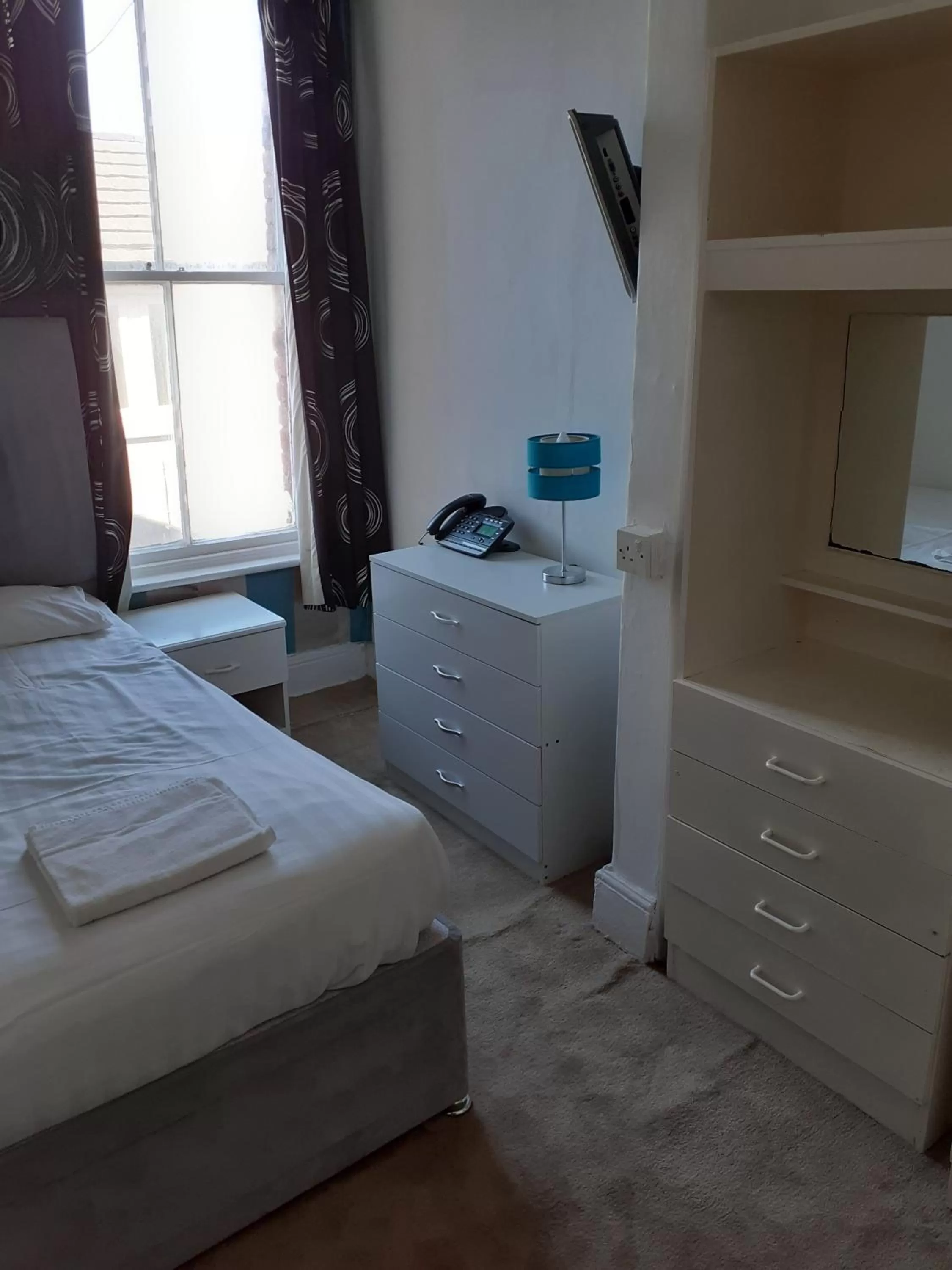 Photo of the whole room, Bed in The Coastal Bay Hotel