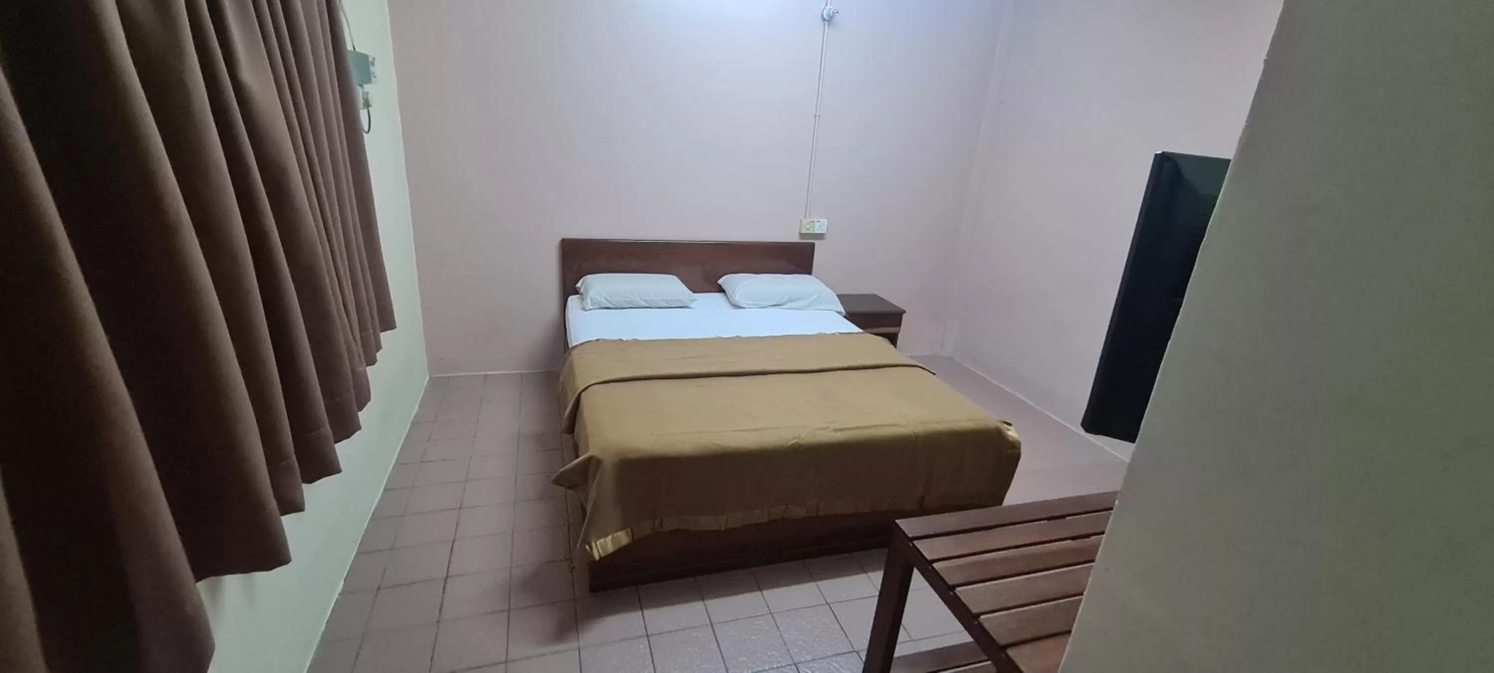 Bed in East Coast Hotel