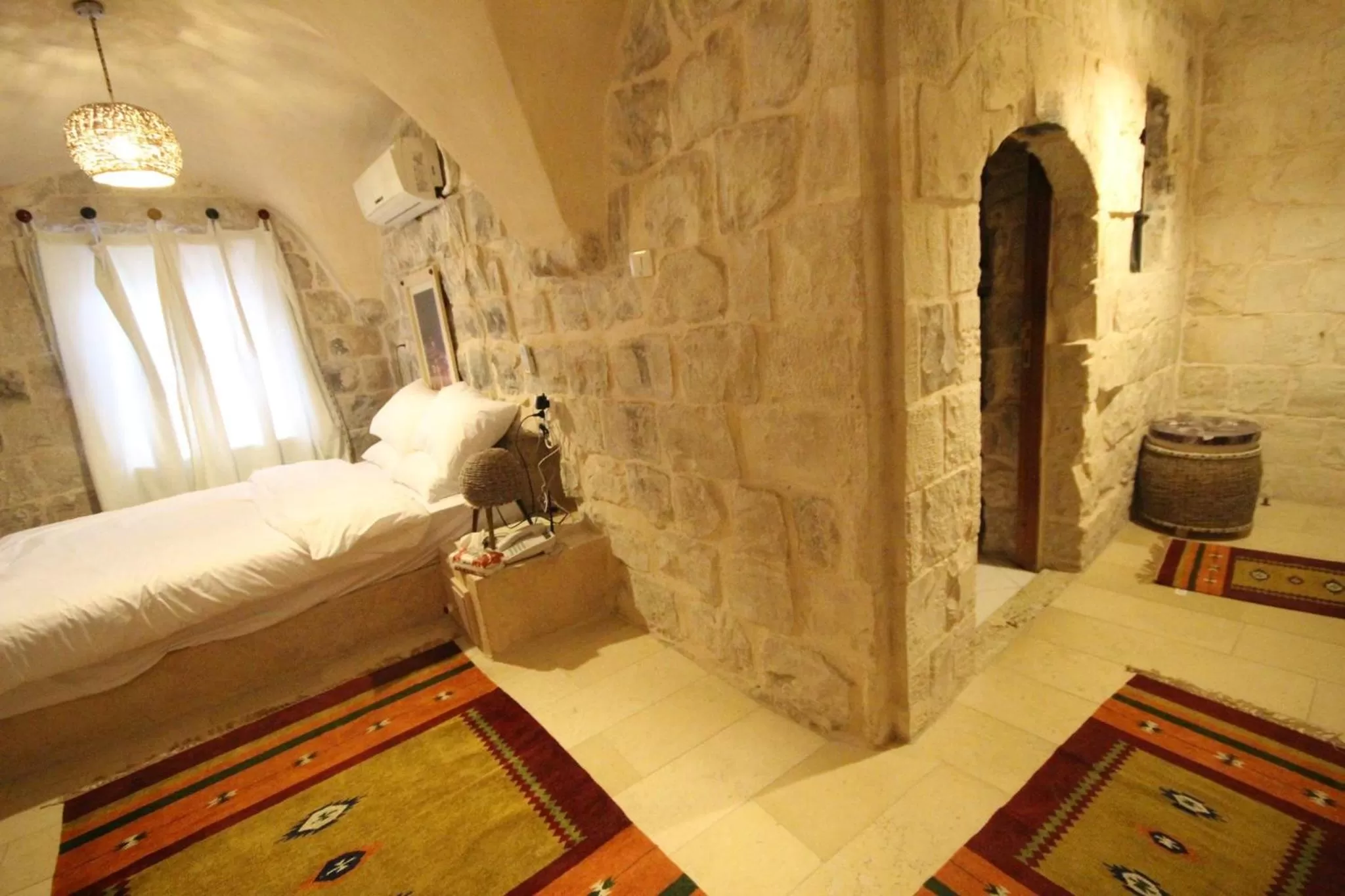 Bed, Seating Area in Khan Alwakala Hotel