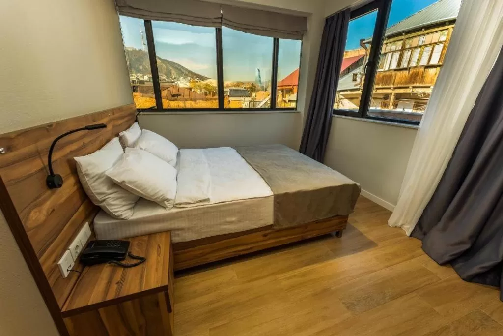 towels, Bed in Address Boutique Hotel