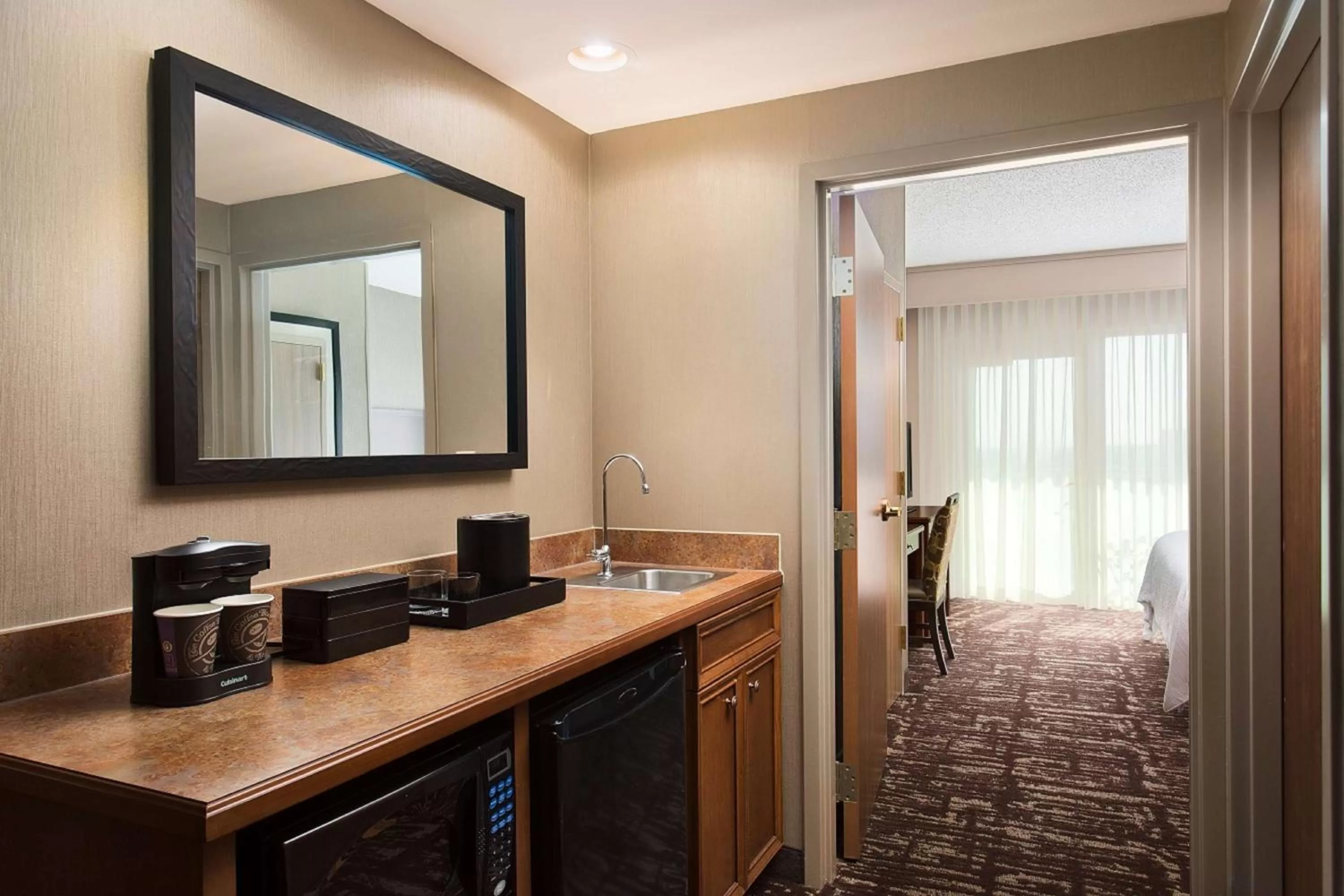 Kitchen or kitchenette in Embassy Suites by Hilton Dallas Frisco Hotel & Convention Center