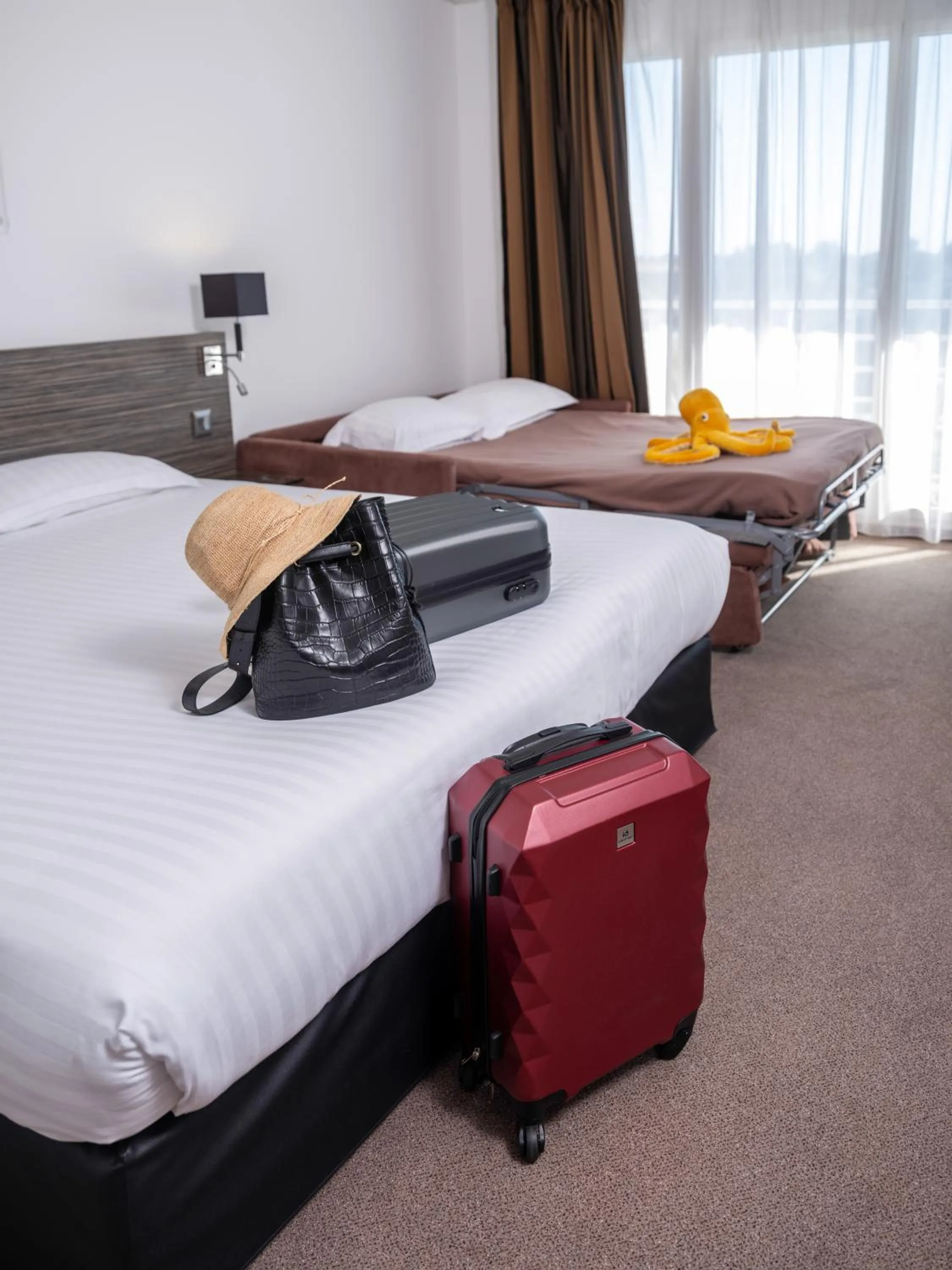 Bed in Golden Tulip La Baule Hotel and Residence