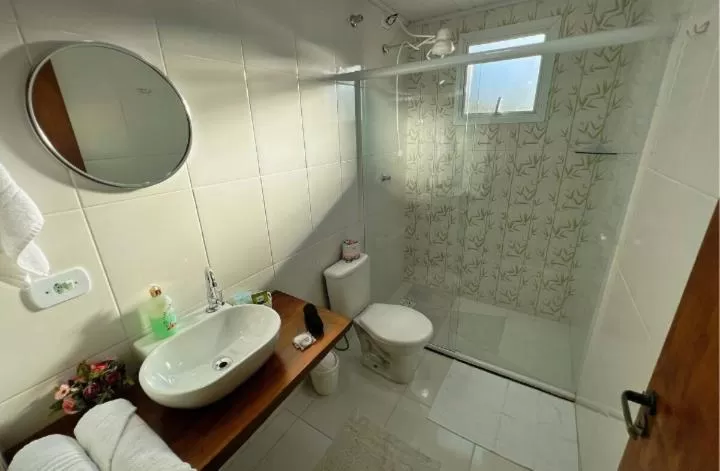 Bathroom in Suítes para fins de semana