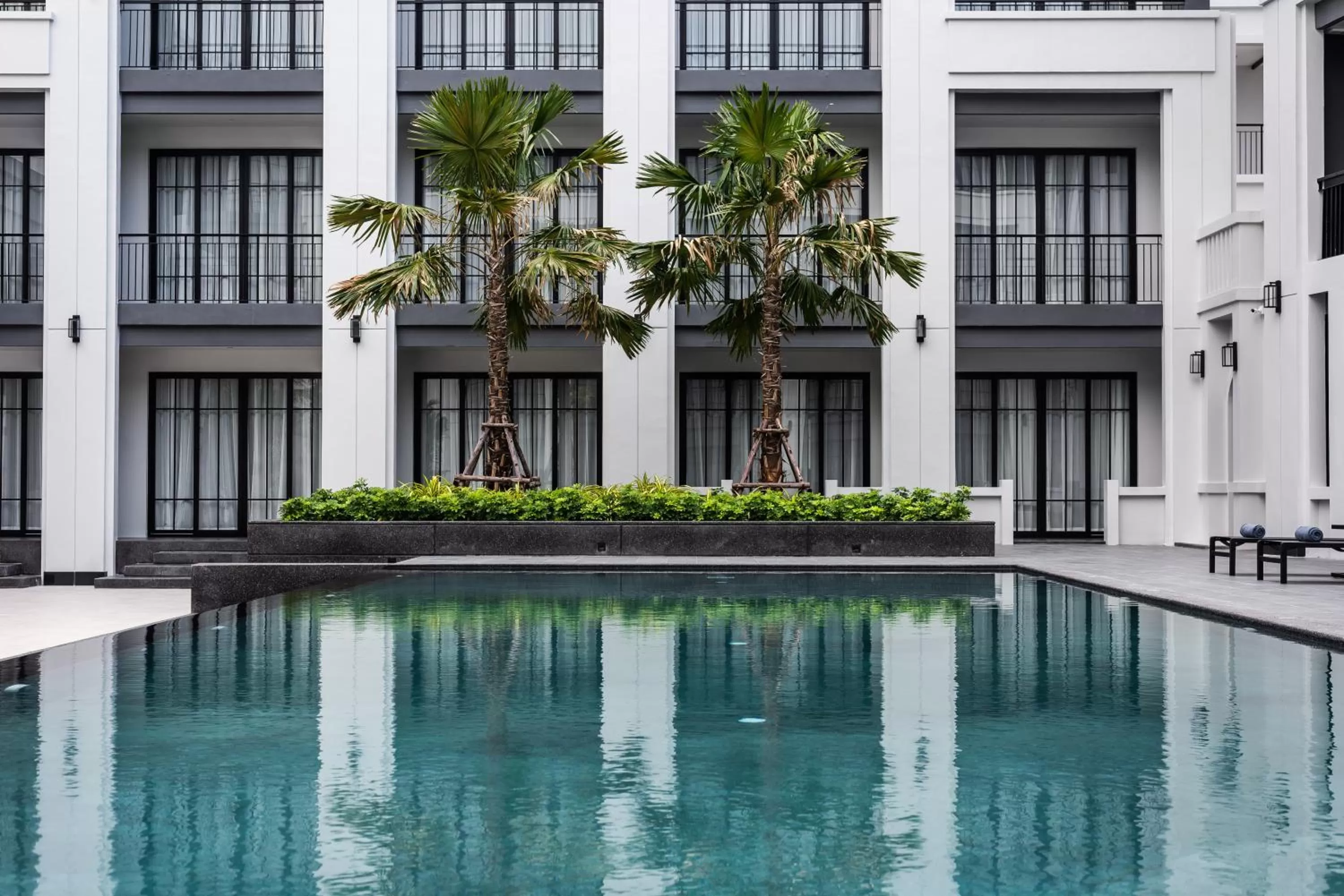 Swimming pool in One Patio Hotel Pattaya - SHA Extra Plus